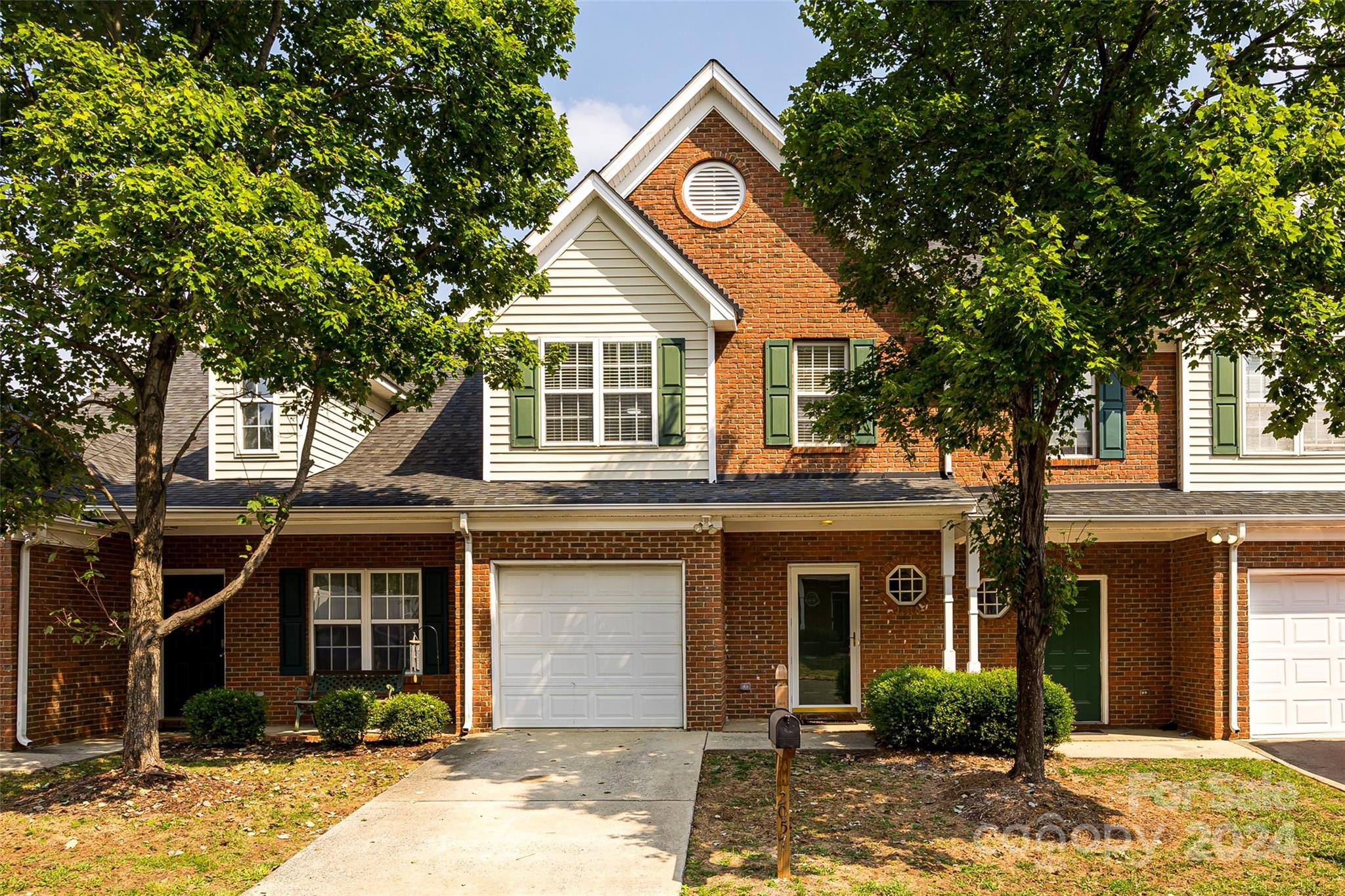 Move-in ready town home in convenient, gated community! Neutral paint and LVP floors throughout. Fresh white kitchen with new granite counters, tile backsplash, new sink & faucet too! Two large bedrooms each with their own updated bathrooms with white cabinetry and new fixtures. HOA covers lawn & exterior maintenance and water. Refrigerator and washer/dryer remain, so all you have to do is unpack and relax! This quiet community is close to Quail Corners for shopping & restaurants and the Blue Line is approx. 1 mile away. Easy access to I-485 and I-77.  Come discover it today!