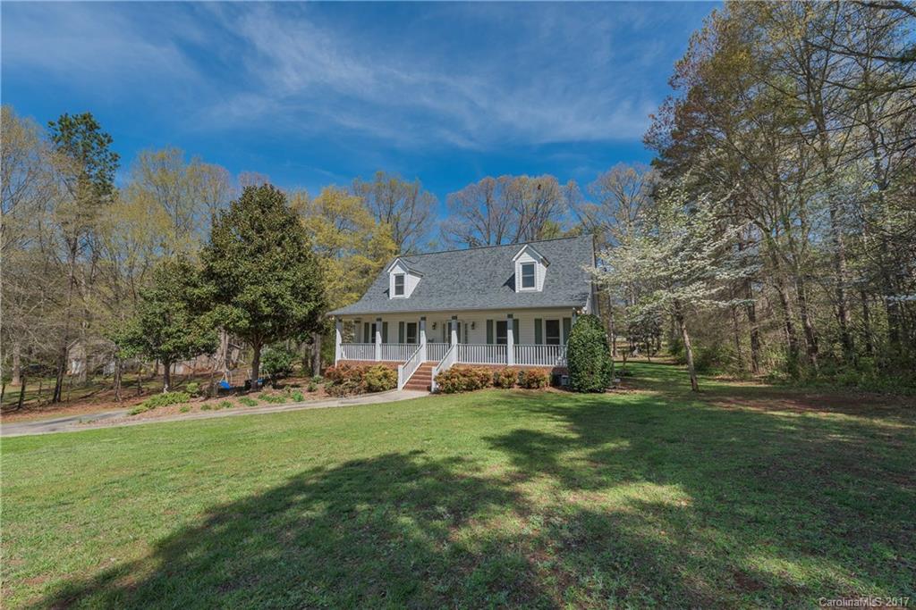 Absolutely adorable Cape Cod on over 1 fenced acre in Norman Farms! Picture perfect rocking chair front porch. Great open floor plan, abundance of natural light,  perfect for entertaining.  Screened-in porch overlooks fantastic backyard.  Master down, two great sized bedrooms up.  More parking than one could hope for with extended parking pad large enough for RV and then some.