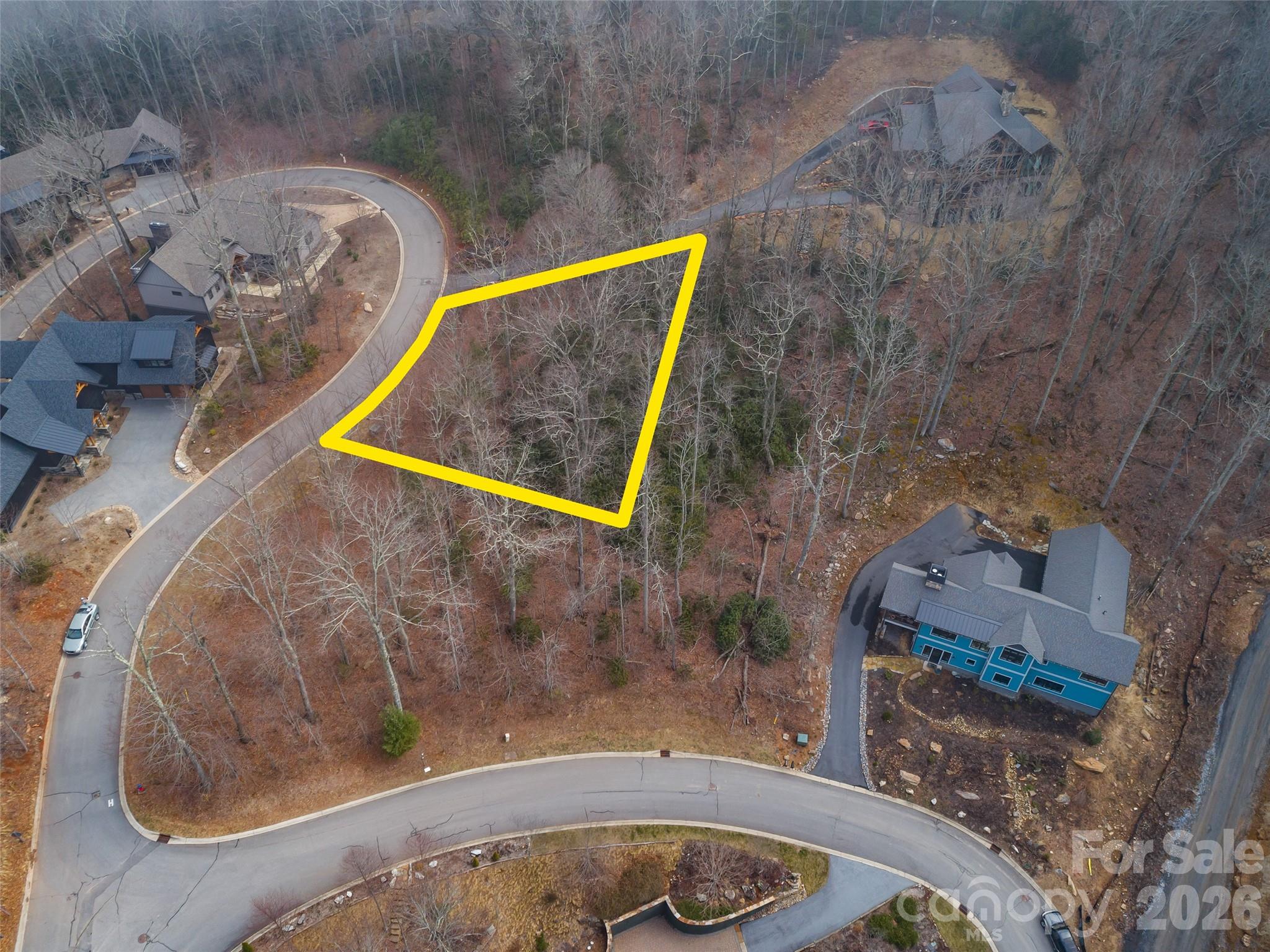 Welcome to 5 Crockett Ridge, beautifully nestled in the quiet mountain community of The Settings of Black Mountain. This .25-acre homesite offers the perfect opportunity to build your dream mountain home or a luxurious getaway retreat. Enjoy the peaceful surroundings while still being conveniently located just minutes from downtown Black Mountain and a short drive to Asheville. Experience the best of mountain living with community charm, natural beauty, and easy access to local dining, shopping, and outdoor recreation.