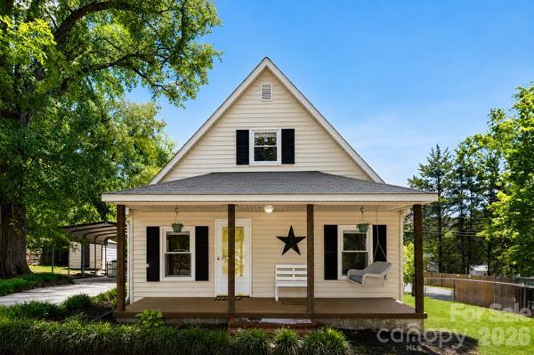 Welcome to this charming Cape Cod-style home sitting on a good size corner lot with a fenced in yard and a detached carport. This is a 3-bedroom, 1.5-bathroom home with a bonus space upstairs, an additional room, and half bath. Downstairs is a very spacious kitchen with plenty of cabinet and counterspace and it opens up to the living space. The full bath downstairs is huge and has been newly renovated. There is still a tub hookup under the floor that is ready to hook back to a bathtub if that is a preference. At the back of the home is a large sunroom. The crawlspace has been fully encapsulated. This home is in the heart of Bessemer City and is convenient to restaurants, shopping, and Highway 85. Don't miss out on this home!