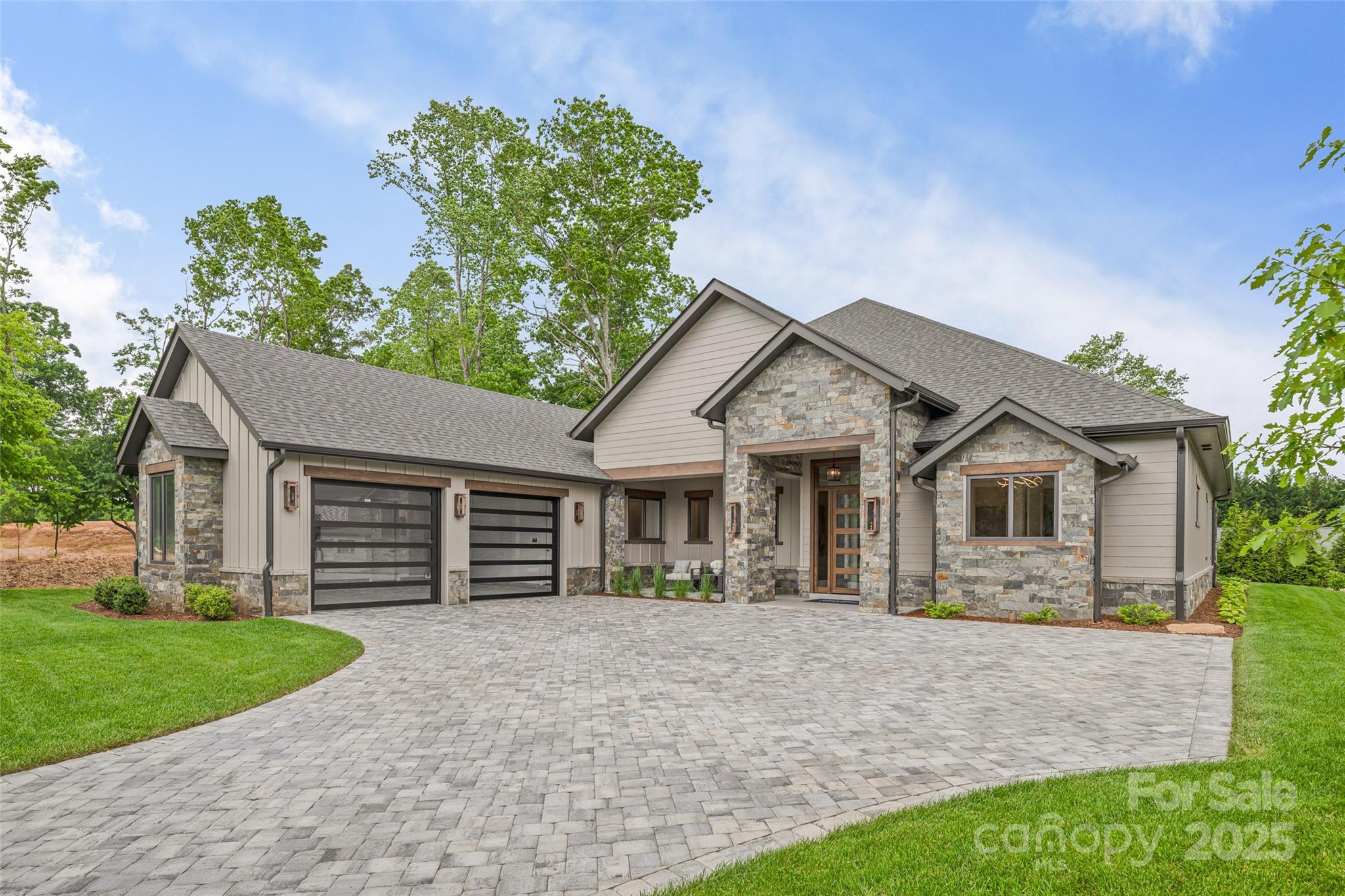 Fabulous one-level living in coveted Cove Park in The Cliffs at Walnut Cove with mountain views! Designed with convenience in mind, this well-appointed new construction home is dressed to impress with beautiful finishes! The flow of this brilliant open floorplan invites you to come in and leave the rest of the world behind! Gracious entertaining is easy from your gourmet kitchen with abundant storage, waterfall island, and hidden walk-in pantry! The Wellness Center, pools, tennis court and walking trails are just steps away, and just a short drive to club dining and the Jack Nicklaus Signature Golf Course! With easy access from the Misty Valley security gate, you will be close to all the wonderful sites, shops and restaurants that Asheville has to offer. Enjoy a lock-and-go lifestyle or settle in for year-round living! Come experience the thrill of the modern mountain retreat and become a part of this vibrant community that is ready to welcome you home!  Membership available.