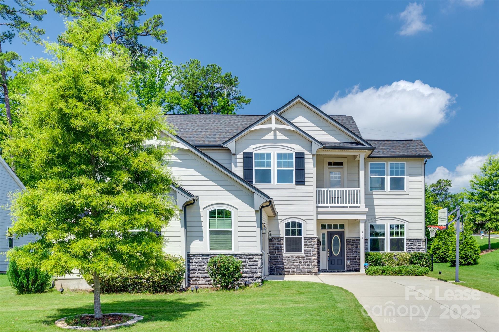Gorgeous 4 bed 3.5 bath French country home in the heart of Lake Wylie in Lake Crest! This stunning home has too many extras to list! Open floor plan, drop zone, wood flooring, & a guest suite w/full bath on the main. Formal dining room w/wainscott panels and tray ceiling. The gourmet kitchen has quartz counters, SS appliances, wall oven, gas cooktop, center island with breakfast bar, a Walk-in pantry and built-ins for an office or homework area. Family room has gas fireplace and opens to a large back patio with brick pavers, built in grill, and fenced back yard. Upper level boasts the primary bedroom with a tray ceiling, ensuite bath with a double sink vanity, garden tub, step-in shower. Two nice-sized bedrooms share a full hall bath with double sink vanity and shower/tub combo. Large laundry room w/ cabinets and sink.  Washer/Dryer included. Great Schools! Close to shopping and restaurants. Pets Conditional. **No Cats**. Don't miss this one!
