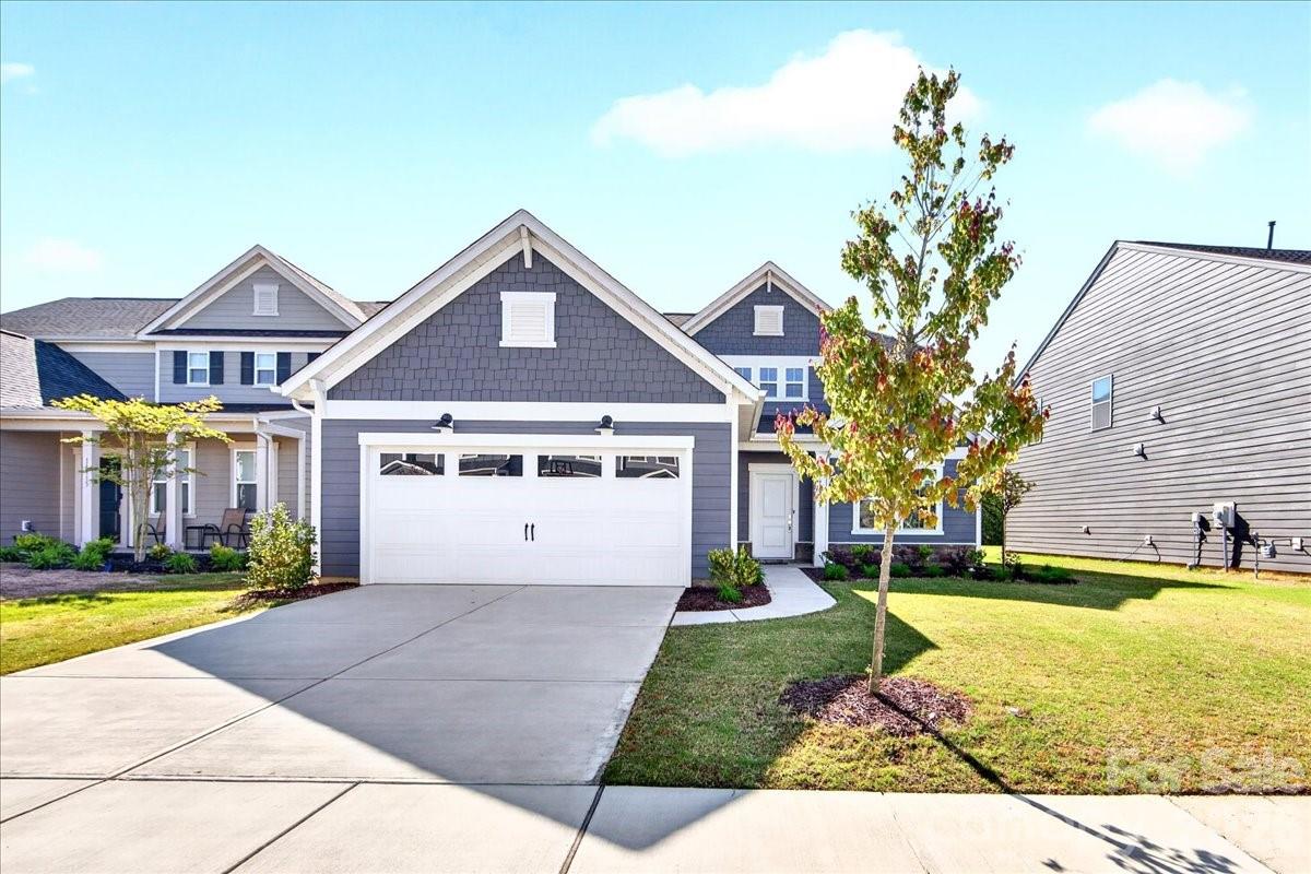 MOTIVATED SELLER. This beautiful home located in the desirable neighborhood- Parkside Crossing that combines comfort, location, and lifestyle in one fantastic opportunity! This looks-like-new 3 beds, 2.5 bathrooms property offers a bright and inviting layout designed for great living and entertaining. The main floor features a spacious primary bedroom along with a dedicated home office with glass french door, providing both convenience and flexibility. Big granite islander, SS appliance, 42" cabinets in the open-concept kitchen, which gives you a comfortable living style.  Upstairs, you’ll find 2 guest bedrooms, a full bathroom and  a generous loft area perfect for a playroom, or additional living space.  Step outside to  the spacious patio, facing a  large, flat backyard that backs to peaceful woods, offering privacy and a relaxing natural setting. The community HOA  includes neighborhood amenities as well as Internet, adding great value and convenience. 25 minutes from uptown Charlotte, few minutes from Carolina Premium Outlet, Rivergate Shopping Center, McDowell Nature Preserve,  Lake Wylie, I-77 and Carowinds! Schedule your showing today! Refrigerator do convey!