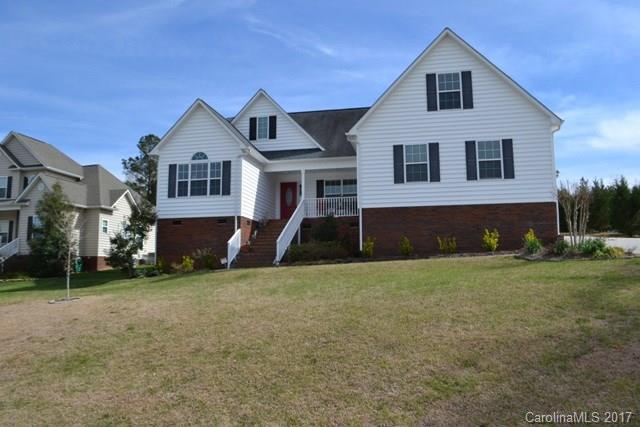 Pristine ranch w/ bonus FROG on a large half acre lot! Beautifully landscaped, open layout, & vaulted family room! Granite kitchen has tile flooring, gas range, stainless appliances, breakfast bar and walk in pantry.  Master suite is on the main, w/ spa-like bath and dual vanities! Large bedrooms w/ wide windows and lots of sunshine! Bonus is spacious, tons of storage area in floored attic. Relax in the screened porch overlooking a view of the green grass, privacy trees, & soon to bloom azaleas!