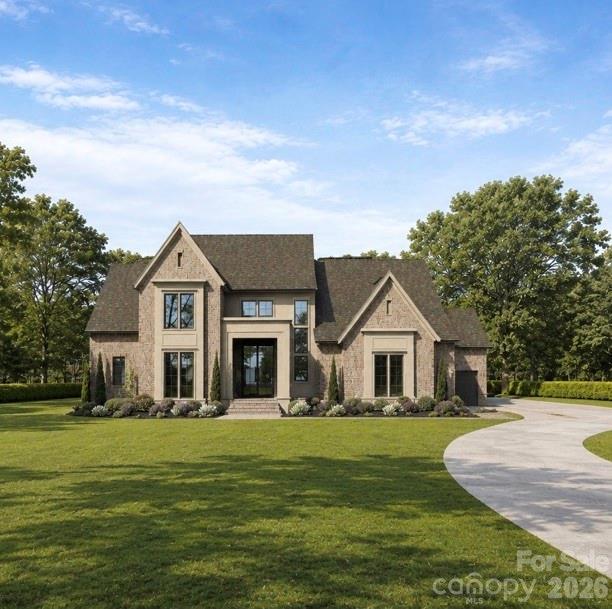 Award Winning Luxury-The Bel Rose II by Linnane Homes located in the highly desirable development Twin Lakes of Weddington. Experience unparalleled craftsmanship in this stunning estate featuring the acclaimed Bel Rose II floor plan. Combining grand architectural details with modern functionality, this home is designed for those who demand the best. Main Level Highlights of this plan include: Private Primary retreat plus a full Guest Suite and dedicated office. A Chef's Kitchen with high-end finishes featuring a massive island and huge scullery. An elegant dining area off the kitchen opens to a covered porch with fireplace and additional grilling terrace. Upstairs you will find space for everything with 3 additional en-suite bedrooms, a large Recreation room, and a private Exercise room. Premium Extras include a custom steel entry door, conditioned crawlspace, in-ground irrigation, massive walk-in storage space, and so much more! Located in the highly sought-after Twin Lakes community, residents enjoy scenic walking trails, a waterfront gazebo, pickleball courts, and a community dock stocked with kayaks, canoes, and paddle boards. 

The Linnane Advantage:Work with an award-winning builder and gain exclusive access to a state-of-the-art in-house design center to curate your perfect finishes.