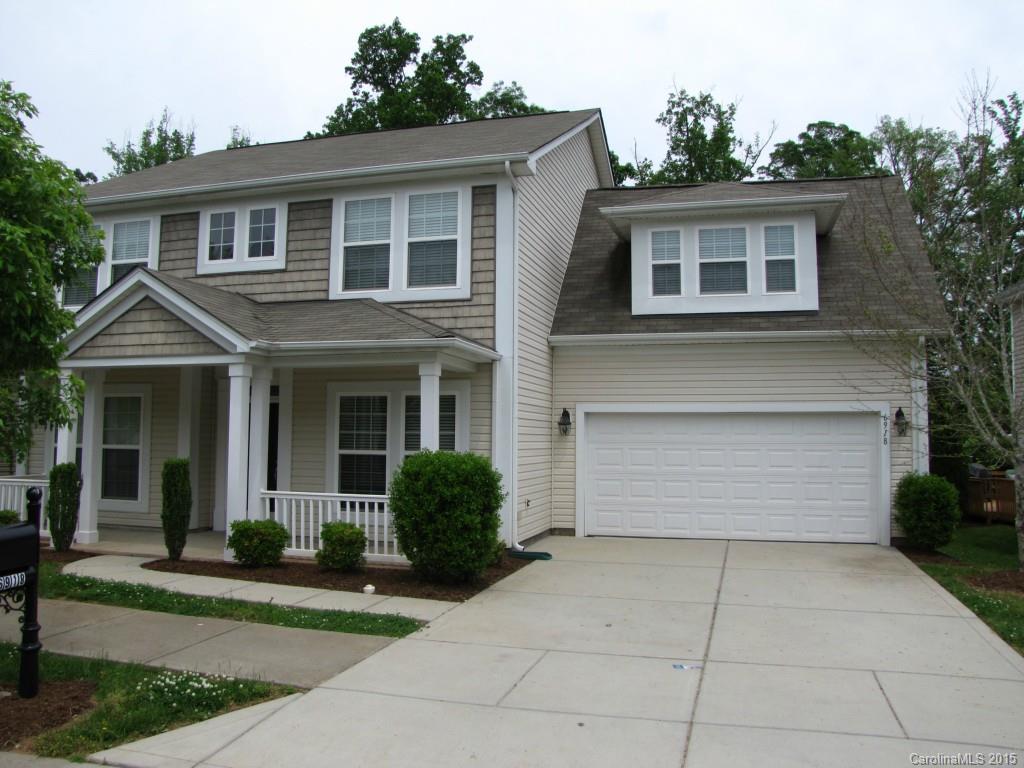 Great curb appeal! Home in desirable community features crown molding, wainscoting, tray ceilings. Floor plan includes formal living and dining rooms, 2-story family room w/fireplace, kitchen w/SS appliances, cherry-stained cabinets and built-in desk. Large 1st-floor master w/walk-in closet, bay window, access to deck overlooking fenced back yard. Master bath includes dual sink vanity, tiled shower, garden tub, private water closet. Three secondary bedrooms, full bath and bonus room up!