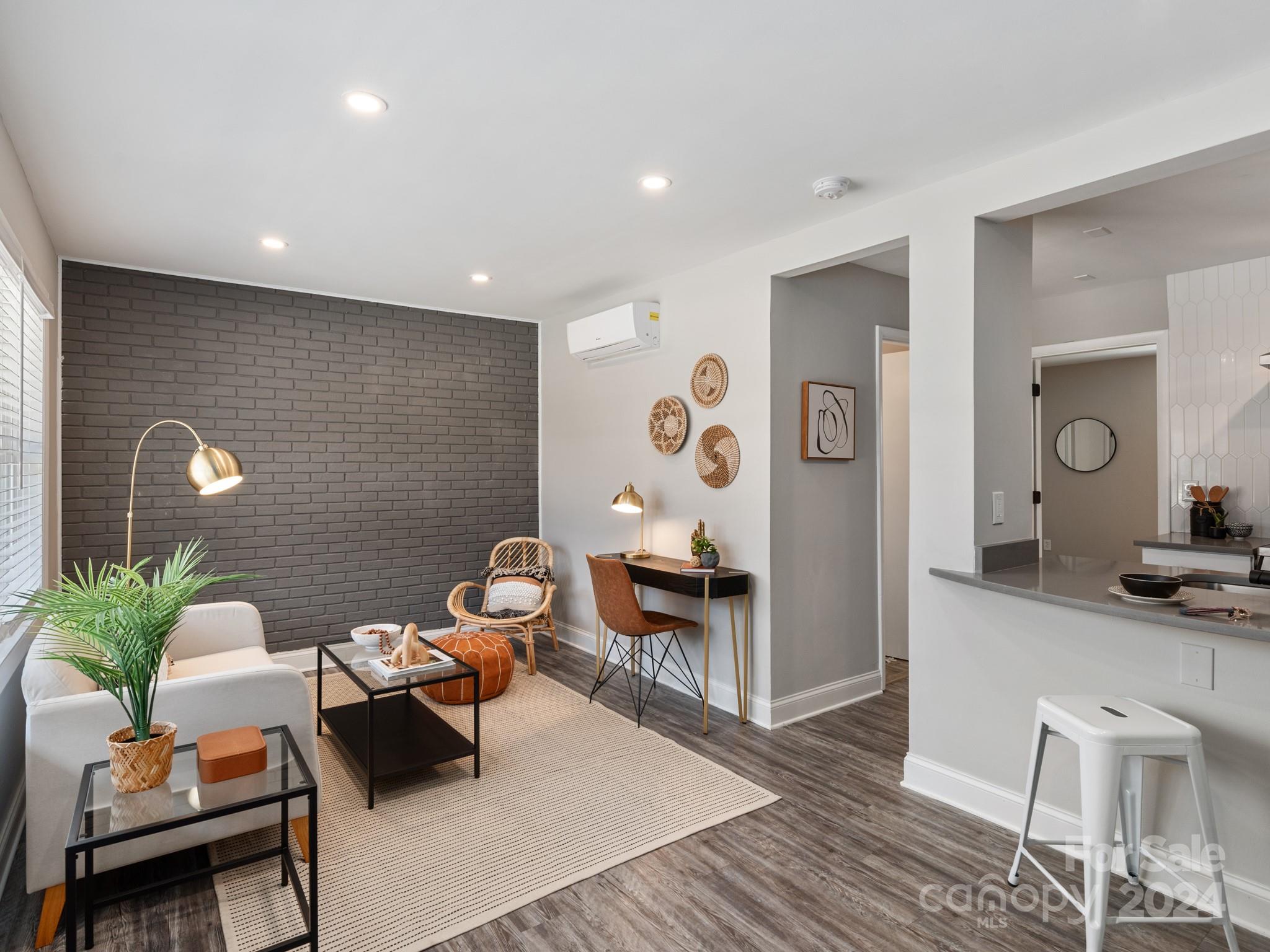 BRAND NEW CONDO CONVERSION w/ INTRODUCTORY PRICING! Gated community less than a mile from NoDa! Fully renovated condo overlooks cheerful courtyard setting. New smoothtop electric range w/ built-in air fryer, quartz counters w/ breakfast bar, new cabinets, stainless oven hood & fridge. Beautifully upgraded bathroom w/ modern tile. LVP floors &new windows. Model home pictured. Vacant unit for sale is very similar. Community recreation area in courtyard perfect for tailgates/ cookouts. Fenced dog park & plenty of open parking in lot! This is a premium courtyard-facing unit with full interior brick wall. HOA dues include internet and valet trash service. Appraised higher than List Price! NO RENTAL RESTRICTIONS!
