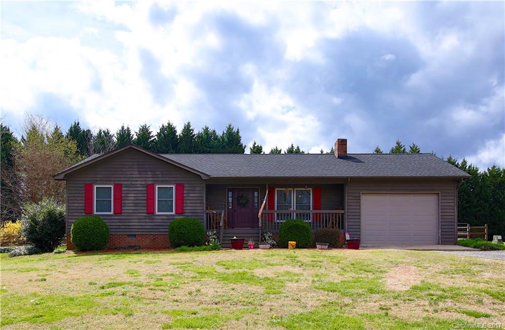 This one is the picturesque country home you've been waiting for. Radiating with Southern charm, it's got the incredible open floor plan you've been looking for, tons of room for game day parties and family get-togethers, three cozy bedrooms and two full baths, and the list goes on. With just under 1400 sq ft and over an acre of land, this one's just calling your name. Don't forget about the detached workshop too! This one's everything you've been waiting so patiently for, don't let it get away!