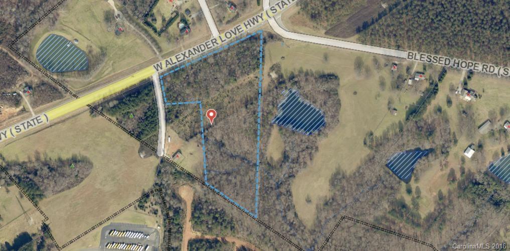 This is a nice lot with 10+ acres, road frontage on Alexandra Love Hwy.  The lot can be subdivided into 1 acre lots.  Come build your dream home!