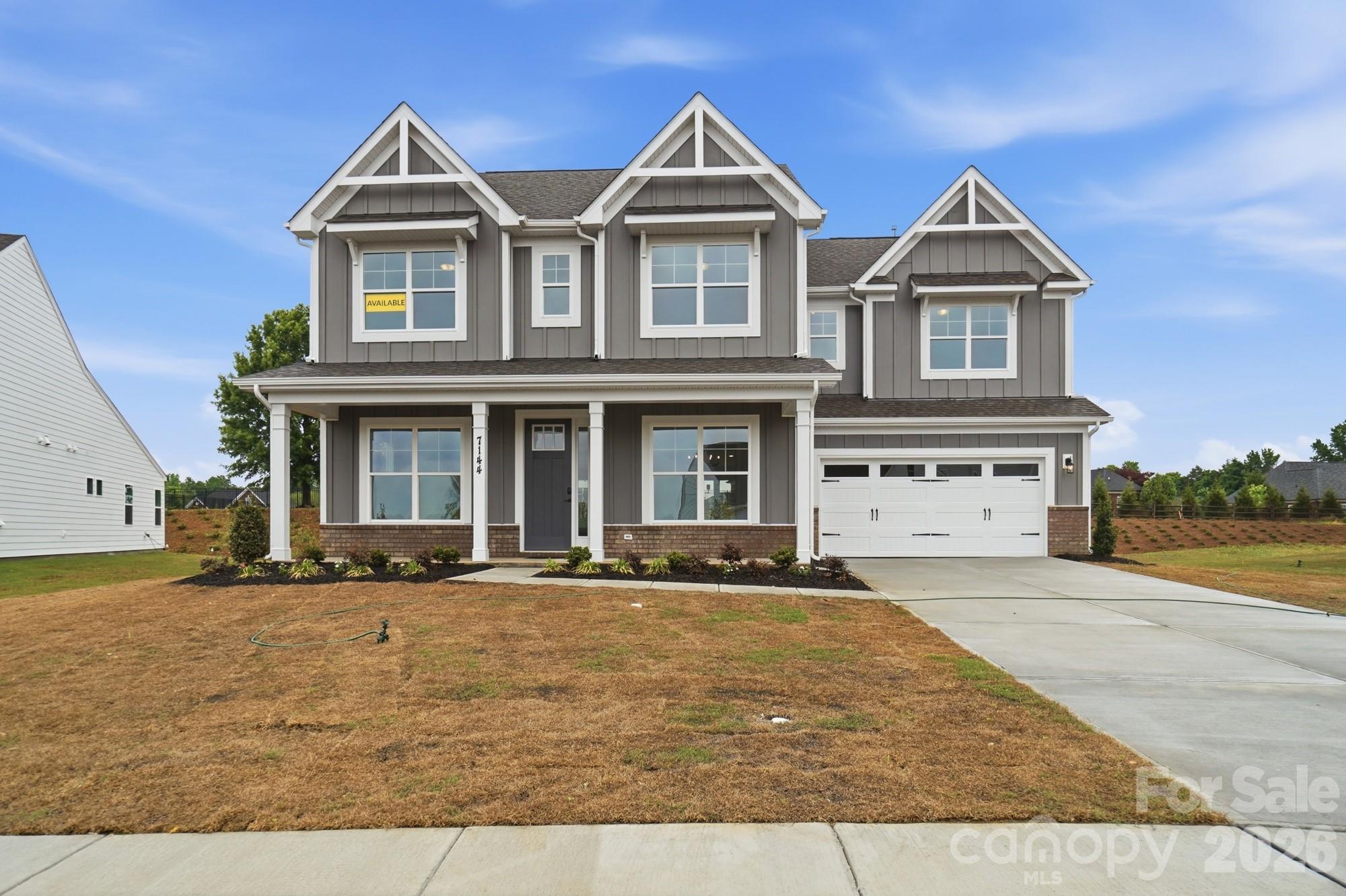 This Colfax floorplan is one you won't want to miss in the all-new Harmony community in Harrisburg. The home features five bedrooms, four full baths, and more than 3,500 square feet of living space. The main floor includes a guest suite with a full bathroom, large kitchen with white cabinets and matte black hardware, farmhouse sink, an oversized island, quartz countertops, tile backsplash, and walk-in pantry. The main level also features an office, dining room, powder bath, breakfast area and large open family room. The upper level boasts 9-foot ceilings and includes the primary bedroom and bath. The primary suite features a tray ceiling, luxury shower with semi-frameless door, dual vanities and linen closet. The upper level also offers 3 additional bedrooms, 2 bathrooms, laundry room with tiled flooring and a large bonus room with closet space. Tray ceilings are also featured in the foyer and dining room. Family room features a gas Cosmo fireplace accented by a shiplap wall and slate surround. Outdoor living is made easy with a screened porch. Neighborhood amenities to include a cabana with outdoor pool, perfect for relaxing and entertaining.