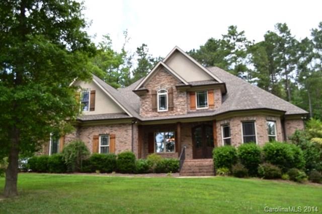 Beautiful brick home with tons of living space! Grand two story foyer, formal dining room, great room has lovely coffered ceiling! Awesome granite kitchen with stainless appliances, tons of cabinets and counter space. Master and guest bedroom on main level. Upstairs houses 2 additional bedrooms, large landing area and a media room plus two full baths, huge bonus room. Outdoor living at its best with a screen porch, large patio, salt water pool, fenced back yard. A must see home