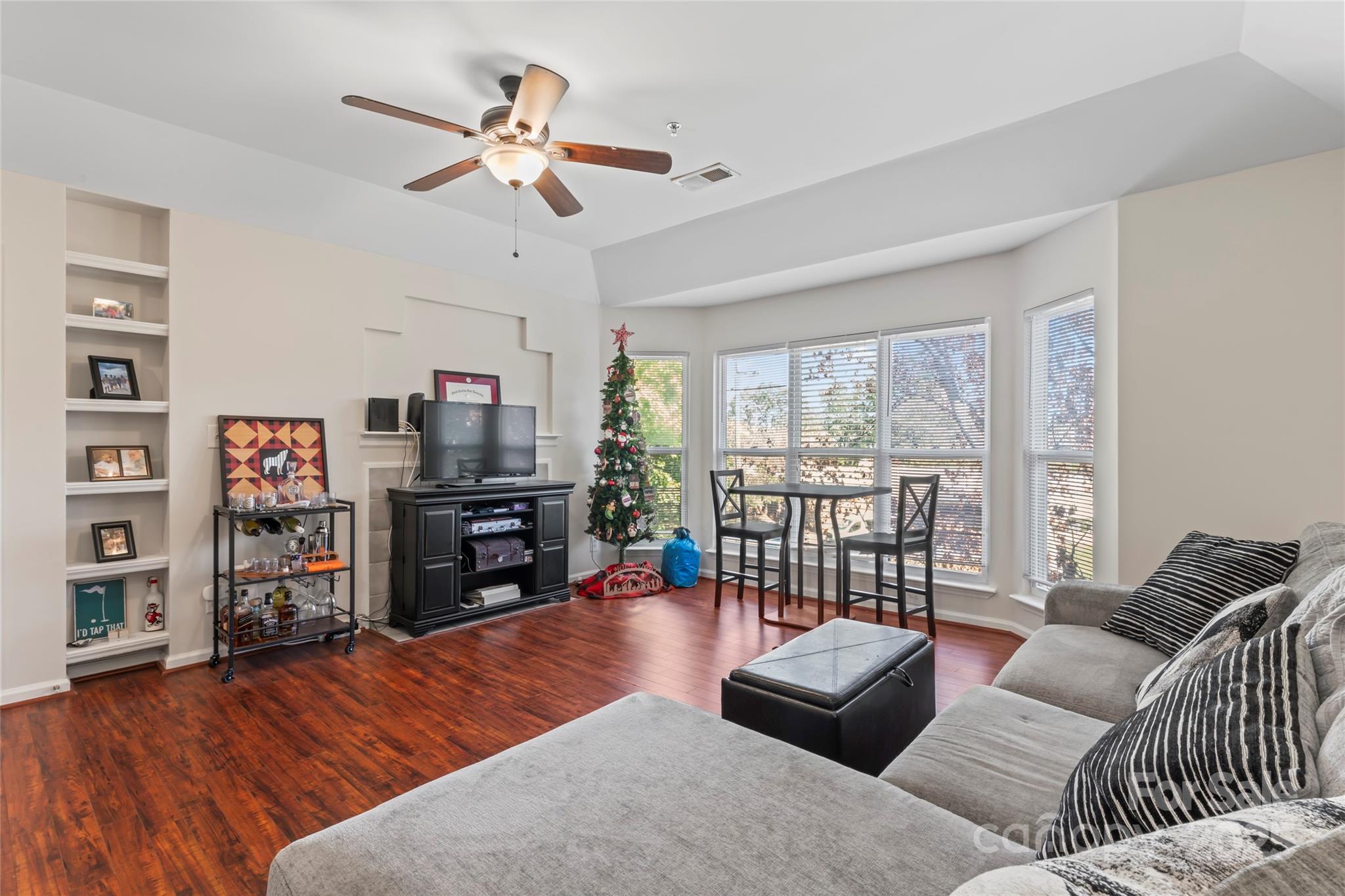 Uptown living meets turnkey investing in this well-maintained 1BR/1BA condo in Charlotte’s Fourth Ward. The open floor plan feels bright and spacious with a wood-burning fireplace, granite countertops, stainless steel appliances, ceramic tile kitchen and bath, custom walk-in closet, and in-unit washer/dryer. Community amenities include an in-ground pool, fitness center, clubhouse, and patio with grilling area—always popular with tenants and owners alike. Currently leased to a reliable tenant with a healthy rental history and 18 months remaining, this condo offers immediate, stable cash flow. With its prime Uptown location and strong rental demand, it’s a smart investment opportunity and a rare chance to own in one of Charlotte’s most dynamic neighborhoods.