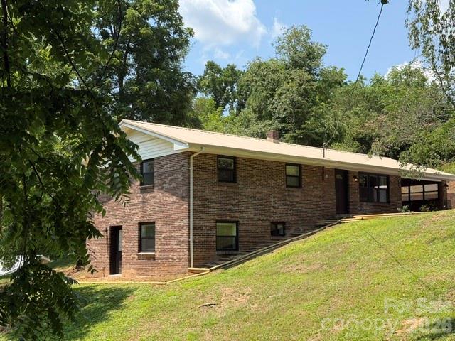 Welcome home to this beautifully updated 4-bedroom, 2-bath move in ready brick ranch located within the Bryson City city limits! Offering the perfect blend of comfort, space, and convenience, featuring everything you need and more. Discover a spacious primary suite complete with an oversized walk-in closet, a beautifully updated kitchen with modern finishes, and plenty of room to spread out with a den, bonus room, and a generous laundry room. Whether you're working from home, entertaining guests, or simply enjoying everyday life, this flexible floor plan has space for it all.
Outside, you'll appreciate the carport, large yard with plenty of room for gardening, pets, or play, and the convenience of being just minutes from downtown Bryson City. Enjoy the best of Western North Carolina right at your doorstep! You'll be close to scenic hiking trails, pristine mountain lakes, world-class whitewater rafting, the Great Smoky Mountains, fishing, shopping, dining, and endless outdoor adventures.
Don't miss this opportunity to own a beautifully updated home in one of Western North Carolina's most desirable mountain towns. Schedule your private showing today!