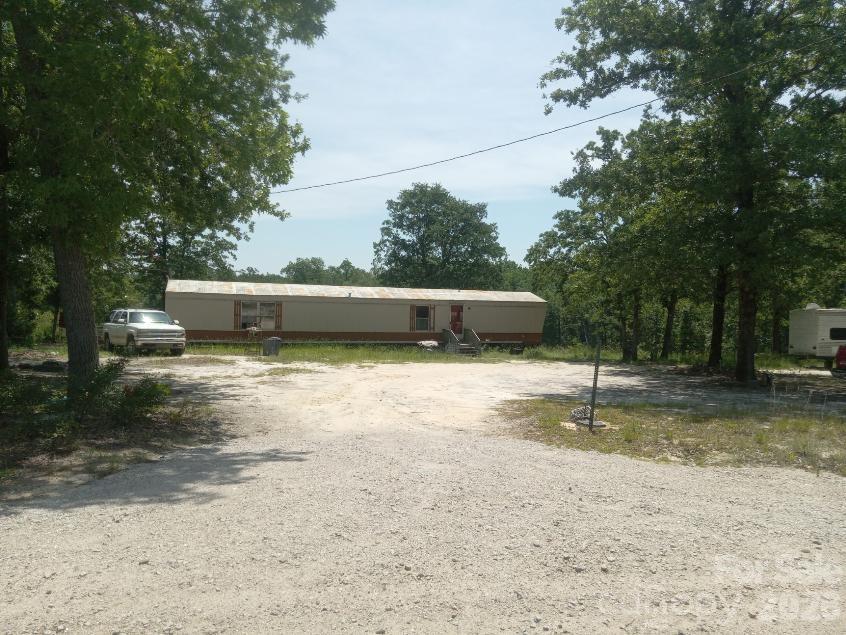 Attention investors, flippers, and landlords--here is your opportunity to add another property to your portfolio. Situated on two acres in Kershaw, this two-bed, two-bath manufactured singlewide home offers privacy, quietness, and seclusion nestled among the trees. With plenty of potential, this fixer-upper is ready for your vision and creativity. There is an additional septic on the property as well as a non-working well and an additional power pole. Whether you are looking for your next investment property, rental opportunity, or renovation project, this property offers endless possibilities. Come take a tour and imagine what this property could become.
