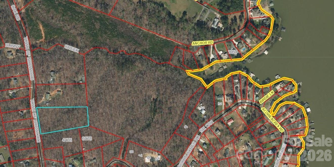 Rare opportunity to own 2.78 acres in the highly desirable Lake Tillery area! This wooded tract offers the perfect blend of privacy, convenience, and potential with public water and sewer available. Whether you're dreaming of building a custom lake-area retreat, creating a private estate, or exploring investment possibilities, this property provides the space and flexibility to bring your vision to life.

Located just minutes from Lake Tillery, enjoy easy access to boating, fishing, dining, and outdoor recreation while still being close to shopping, schools, and everyday conveniences. With ample road frontage, beautiful natural surroundings, and utilities available, opportunities like this are becoming increasingly difficult to find.

Bring your builder, your plans, and your imagination—this is your chance to secure acreage in one of Stanly County's most sought-after locations!
