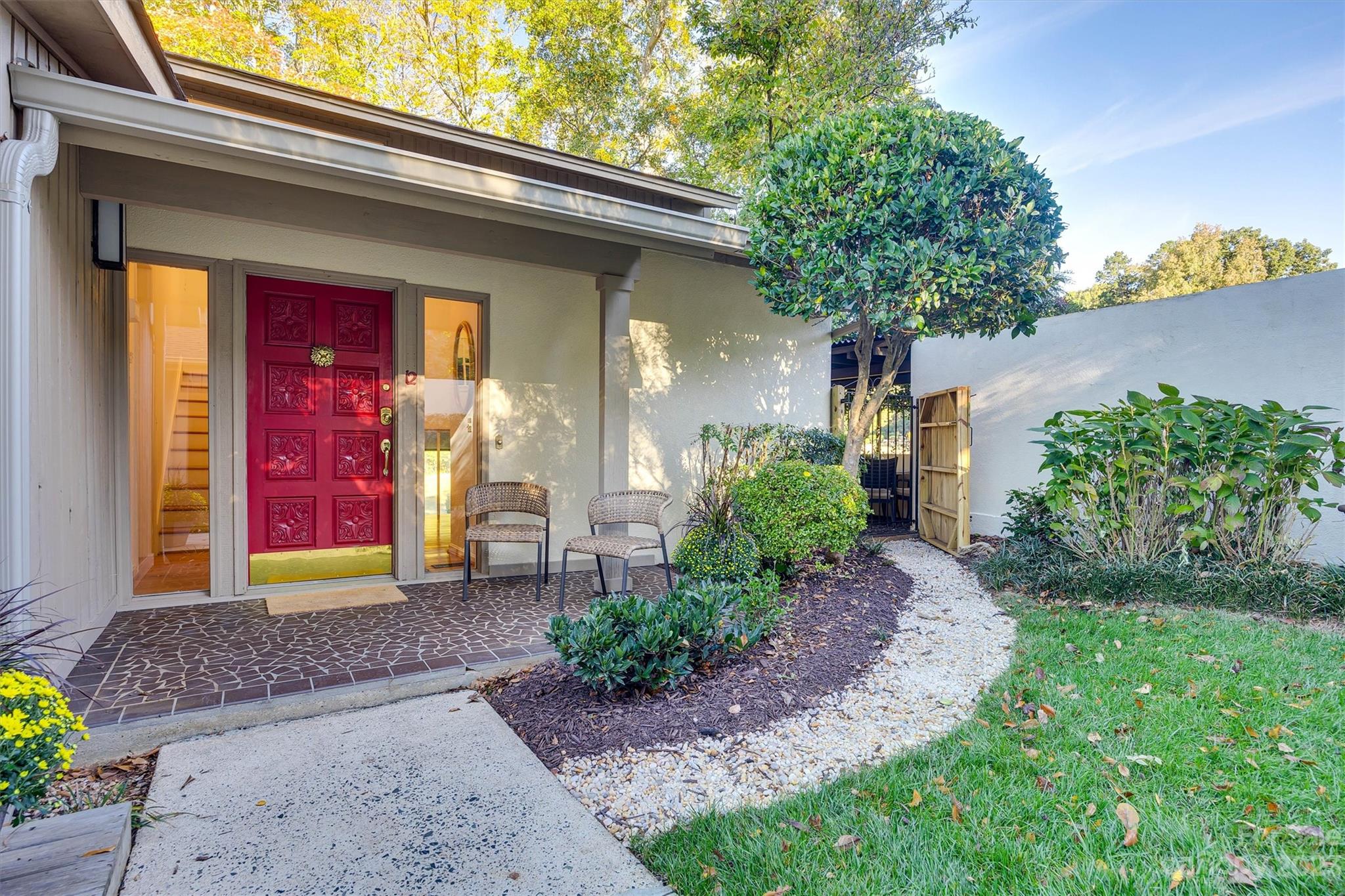 This stunning home is located on the golf course in amenity rich River Hills, offering breathtaking views from every angle. With its spacious and open floorplan, the home is perfect for entertaining. The renovated gourmet kitchen features top-of-the-line appliances, including an induction cooktop, white cabinets, a large eat at island and plenty of counter space for meal prep. The master suite is a true retreat, complete with a luxurious en suite bathroom that has been recently renovated and a private balcony overlooking the lush green fairways. Secondary bedrooms and a completely redone full bathroom complete the upper level. The lower level features a private office with fireplace and view of golf course, an oversized great room and a charming sunroom which is the ideal place for breakfast. Enjoy the front, fully enclosed courtyard area where you can unwind after a long day or head to the back patio to take in the serene surroundings.
