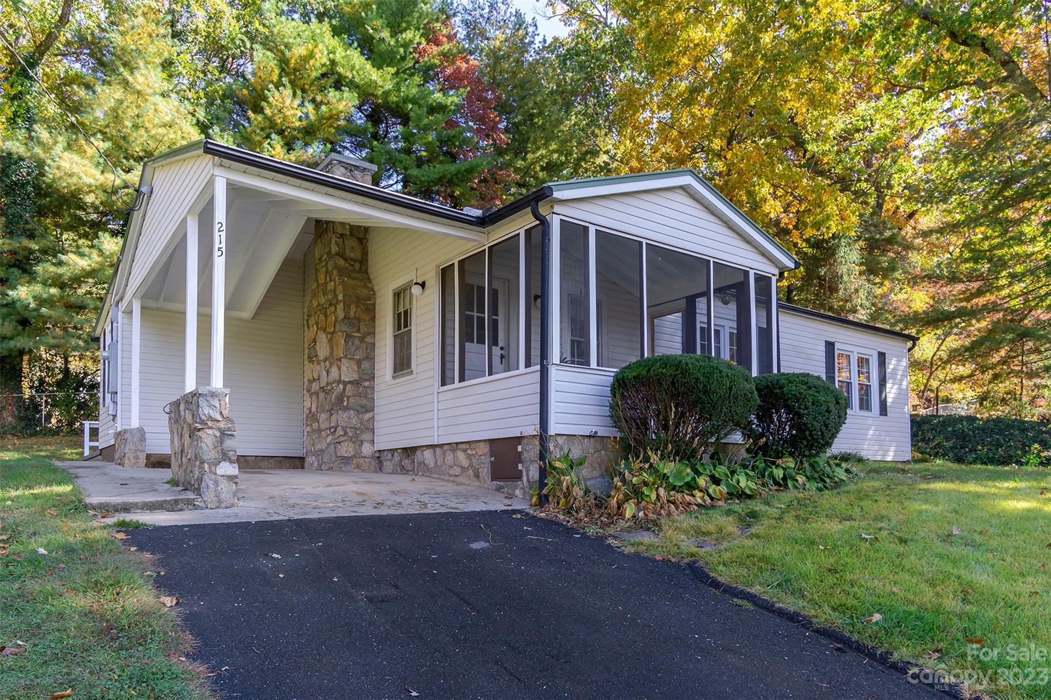 The sweetest cottage awaits you in South Asheville! Just outside city limits you will find this adorable 3 bed, 2.5 bath home complete with a screened in front porch and open back patio. Boasting unique details like beams in the living room, bead board in the laundry room and whimsical wallpaper touches, this home is a joy to spend time in. Everything you need is on one level including a laundry room right off the kitchen. Extra storage can be found in the attic and in the handy outdoor shed. Conveniently situated just minutes to Asheville, Hendersonville and the AVL airport. Agent owned.