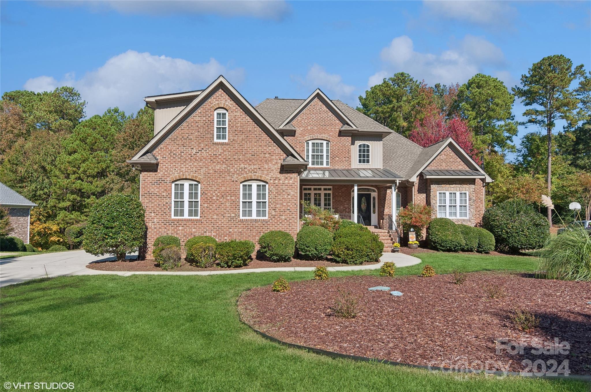 AMAZING RETREAT IN THE HEART OF WATER EDGE SUBDIVISION. ALL BRICK HOME W/ROCKING CHAIR FRONT PORCH.  LOVELY TWO STORY ENTRY & AN OPEN CONCEPT PLAN THAT WILL TAKE YOUR BREATH AWAY.  DINING ROOM W/ SIMPLE ELEGANCE. LARGE KITCHEN W/PLENTY OF GRANITE COUNTER SPACE & STORAGE . ISLAND & TABLE SPACE TO ENJOY. VOLUME CEILING FAMILY ROOM W/CUSTOM BUILT IN/GAS FIREPLACE AND GLEAMING HARDWOODS. NICE SIZE LAUNDRY ROOM W/ UTILITY SINK.  PRIMARY SUITE HAS LARGE WINDOW SEAT AREA W/ABUNDANT LIGHT, ACCESS TO YOUR SCREENED IN BACK PORCH. SPA PRIMARY BATH W/GARDEN TUB, DOUBLE VANITIES, LARGE WALK IN CLOSET AND WALK IN SHOWER,   
2ND FIRST FLOOR BEDROOM W/LOVELY SEATING AREA, PERFECT TO USE FOR THAT IN LAW NEED OR A GUEST SUITE-FULL BATH ACCESS. UPSTAIRS - 3 ADDITIONAL BEDROOMS. NEW CARPET IN BEDROOMS. FULL WALKOUT BASEMENT POOL TABLE , THEATRE ROOM, BEDROOM & FULL BATH & GYM.  MULTIPLY AREAS TO ENTERTAIN, POOL W/HOTTUB,  CABANA W/ TV AND BAR & GAME AREA!  IT IS A PLACE YOU WILL NEVER WANT TO LEAVE..