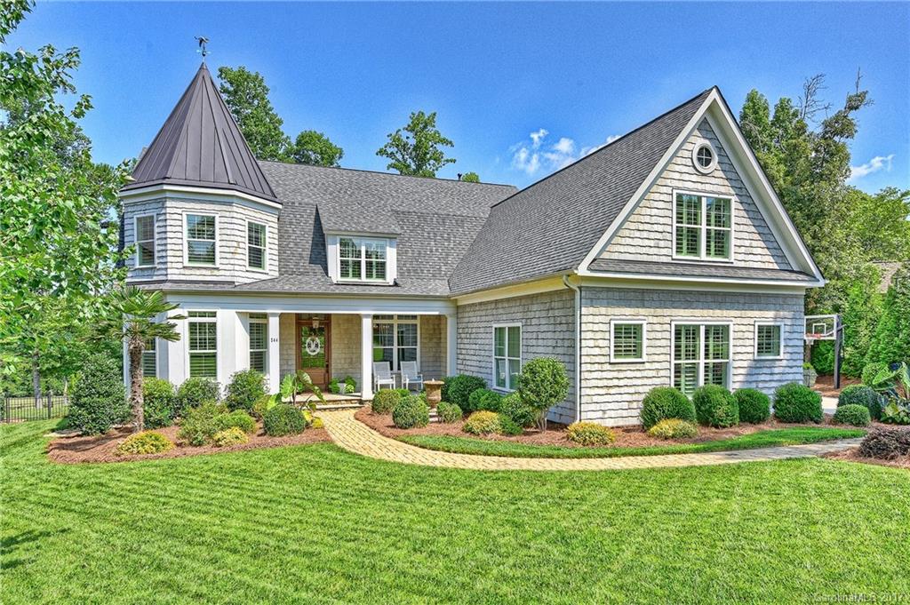 Charming home in Springfield golf course community. Light-filled flowing floor plan. All white kitchen w/built-ins, marble and granite c-tops. Generous breakfast area. Great room features fireplace and built-ins, French doors to terrace. Master en-suite on main. Upper level with 3 large bedrooms (one with private bath, two BR's with jack/jill bath); media rm, bonus rm, exercise rm. Lots of storage. Unique moldings throughout, gleaming HDWDs, Covered terrace with fireplace and golf course view.