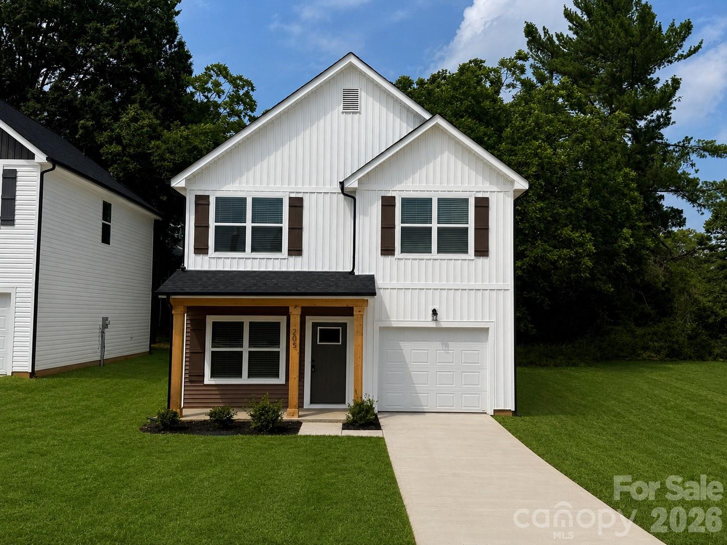 Move-in ready new construction home featuring 9-foot ceilings, LVP flooring throughout, and a stylish kitchen with stainless steel appliances and tile backsplash.
This modern home offers a 1-car garage and contemporary finishes. Conveniently located near Irish Creek Golf Course, downtown Kannapolis, and Landis.
Perfect low-maintenance living in a brand-new home!