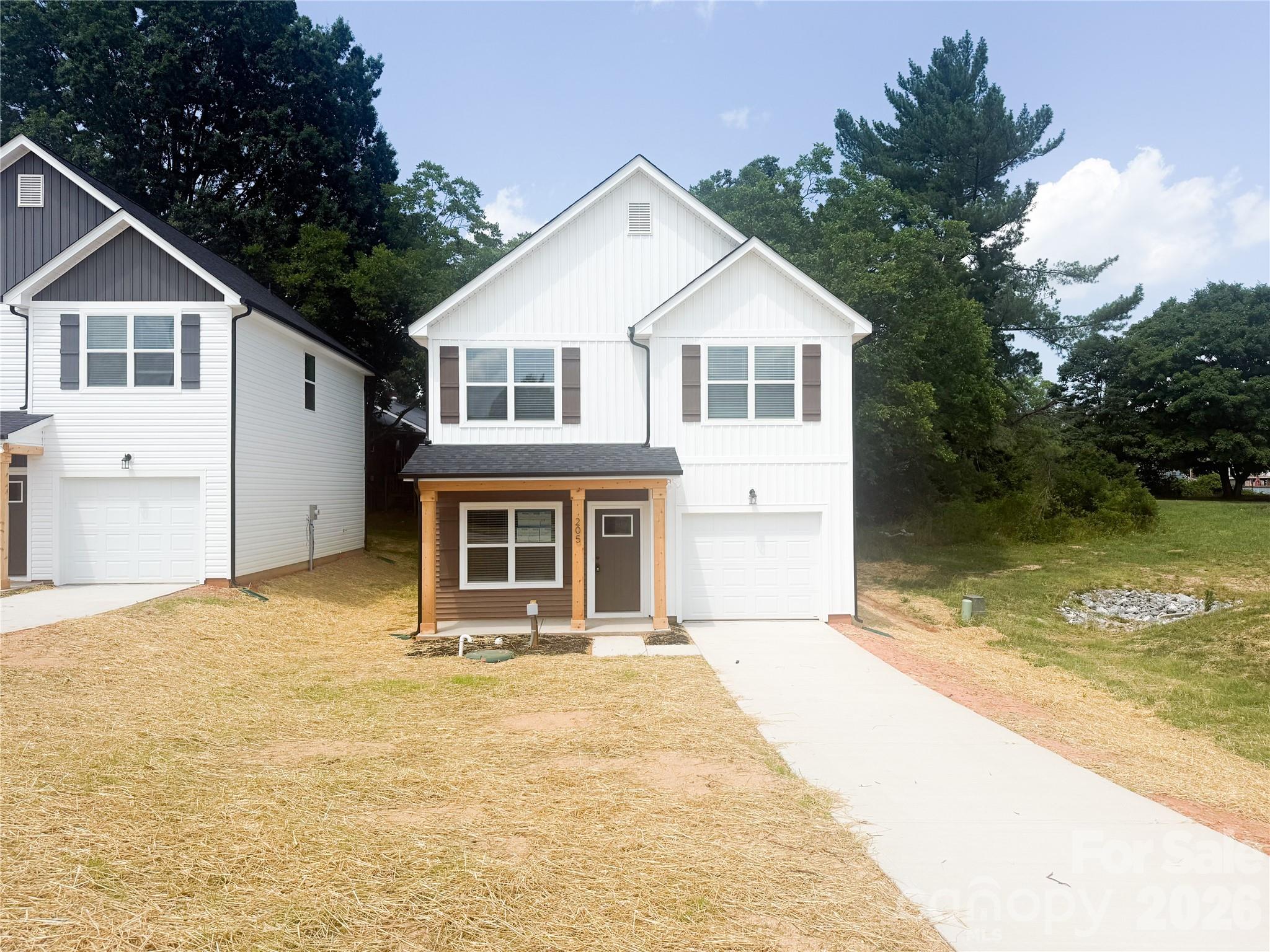 Move-in ready new construction home featuring 9-foot ceilings, LVP flooring throughout, and a stylish kitchen with stainless steel appliances and tile backsplash.
This modern home offers a 1-car garage and contemporary finishes. Conveniently located near Irish Creek Golf Course, downtown Kannapolis, and Landis.
Perfect low-maintenance living in a brand-new home!