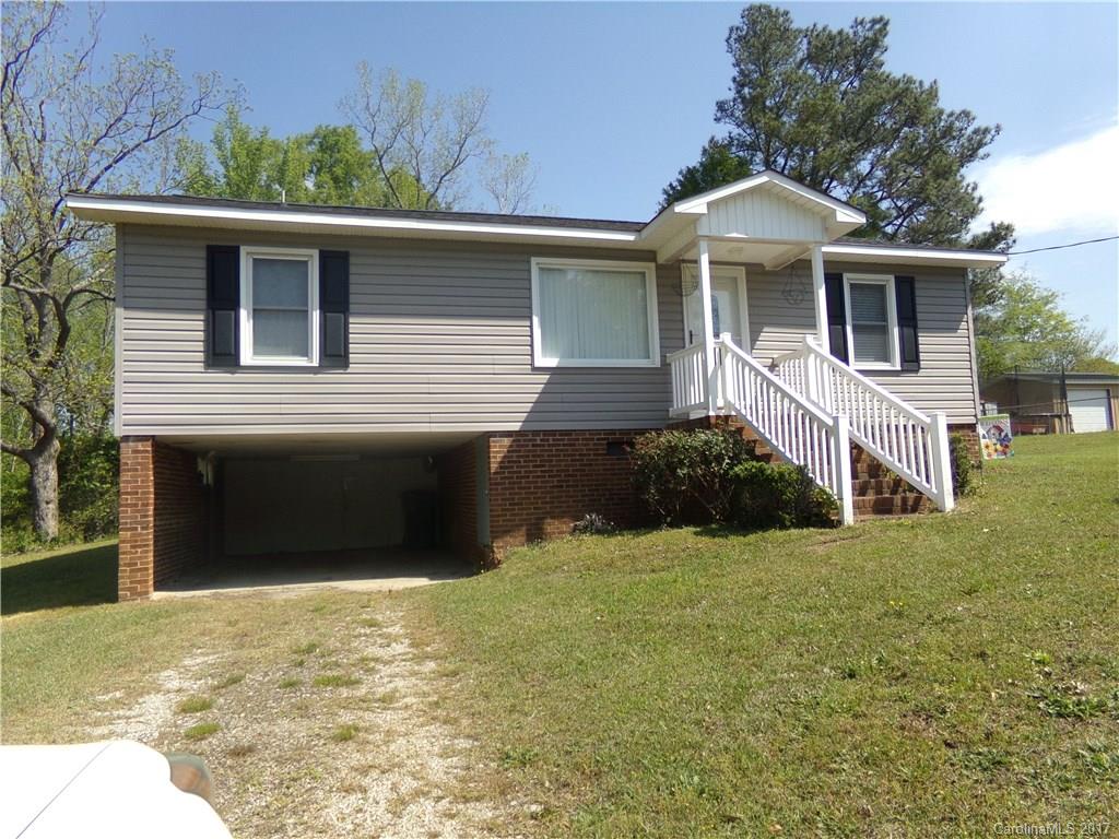 There is no wasted space in this cute one story with drive under small car carport/storage.  It features living room with sunny picture window, open kitchen/dining with large dining space, three bedrooms, one full hall bathroom and one half bathroom. There is washer/dryer hook up in the enclosed rear porch. Great for a starter home or for those who are looking to downsize!
