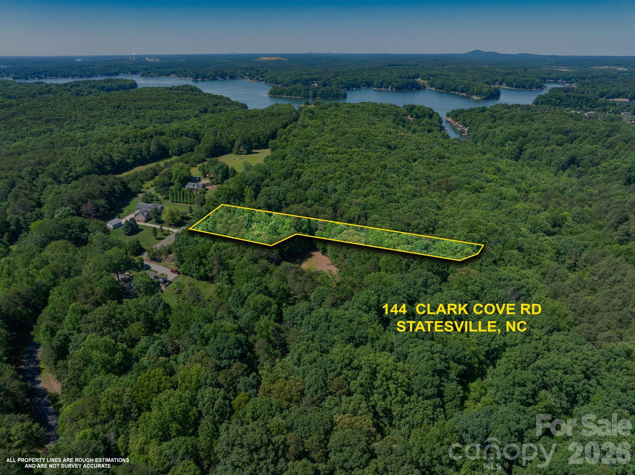 Don’t miss this one, a hidden haven ready to build your forever home or treasured getaway with Lake Norman State Park in your own backyard. Will never have to worry about anyone building around you offering unmatched privacy & serenity like no other surrounded by miles of gorgeous nature and wildlife. Experience the beauty of true seclusion with the last 2.5 acre lot nestled on a peaceful dead-end road with no HOA. No delays with all testing complete! Land Surveyed and Septic Permit approved so you can jump straight to drawing your house plans! Must walk the land to truly appreciate the beauty of the property, family owned for over 70 years its no surprise land like this doesn’t come up often. Offering so much sharing your property lines with this 1,942 acre State Park boasting popular hiking & biking trails, campgrounds, swimming & fishing areas, boat launch & rentals, and a beautiful public beach. Close to Long Island Marina & Boat Launch, I-77, many shops, restaurants, Downtown Troutman and so much more! Watch Video Link here- https://book.werked.com/sites/144-clark-cove-rd-statesville-nc-28677-25379382/branded#