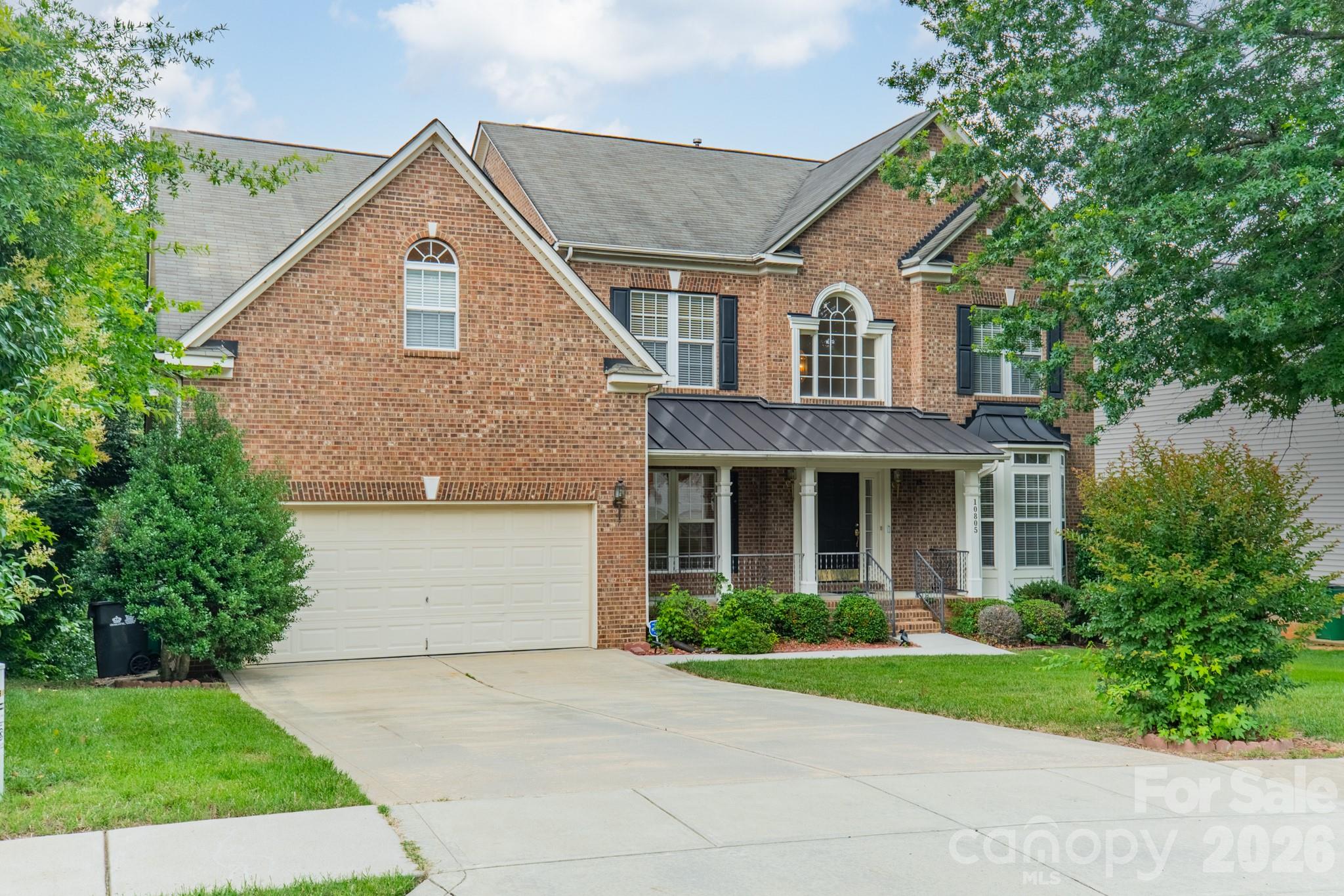 Rarely does a home offer this combination of space, flexibility, and setting. Situated on the largest lot in the neighborhood, this full brick home offers 5,437 square feet of living space, a highly sought-after finished walkout basement, and a versatile floor plan designed to accommodate a variety of lifestyles. Filled with natural light and thoughtfully designed for multiple generations, this home has been the backdrop for years of family celebrations and cherished traditions and is ready for the next family to make it their own.

From the moment you step inside, you'll appreciate the abundance of natural light, soaring ceilings, and impressive scale throughout. The heart of the home is the stunning two-story great room, where a wall of windows and gas fireplace create a bright and inviting gathering space. Overlooking the great room is an elegant balcony, adding architectural character and an open, connected feel between levels.

The spacious kitchen is designed for both everyday living and entertaining, featuring an oversized island with storage, generous counter space, a pantry, and a dining area surrounded by floor-to-ceiling windows. A sunroom just off the main living area provides the perfect place to enjoy morning coffee, unwind with a book, or step outside onto the rear balcony overlooking the private backyard.

The main level also offers formal living and dining rooms, a bedroom, and a full bathroom, creating flexibility for guests, multi-generational living, or a dedicated home office.

Upstairs, you'll find four additional bedrooms, including a spacious primary suite complete with a spa-inspired bath featuring a soaking tub, separate shower, dual vanities, and separate walk-in closets.

What truly sets this home apart is the finished walkout basement. Rarely found in Charlotte, this expansive lower level offers exceptional flexibility with two additional bedrooms, a full bathroom, a second kitchen, and a large open flex space that can easily serve as a recreation room, home gym, media room, in-law suite, or whatever best fits your needs. With both interior and exterior access, the possibilities are endless.

Outside, enjoy the privacy and space of a .78-acre homesite, the largest in the community. Whether you're entertaining, gardening, playing, or simply enjoying the peaceful setting, the backyard offers room to create the lifestyle you've been looking for.

Recent updates include a new HVAC system installed in 2025 and a new water heater installed in 2024, providing peace of mind for years to come.

Combining size, flexibility, natural light, privacy, and one of Charlotte's most desirable features, a finished walkout basement, this is a home that truly stands apart from the rest.

The location is just as appealing as the home itself. Nestled in Kenilworth, you'll enjoy a quiet neighborhood setting with mature trees, sidewalks, and street lights, all while being just minutes from Ballantyne's shopping, dining, golf courses, parks, and everyday conveniences. With easy access to I-485 and some of South Charlotte's most popular destinations, this location offers the perfect balance of privacy and convenience.

It's not often you find a home that combines this much living space, flexibility, and a finished walkout basement in such a desirable South Charlotte location.