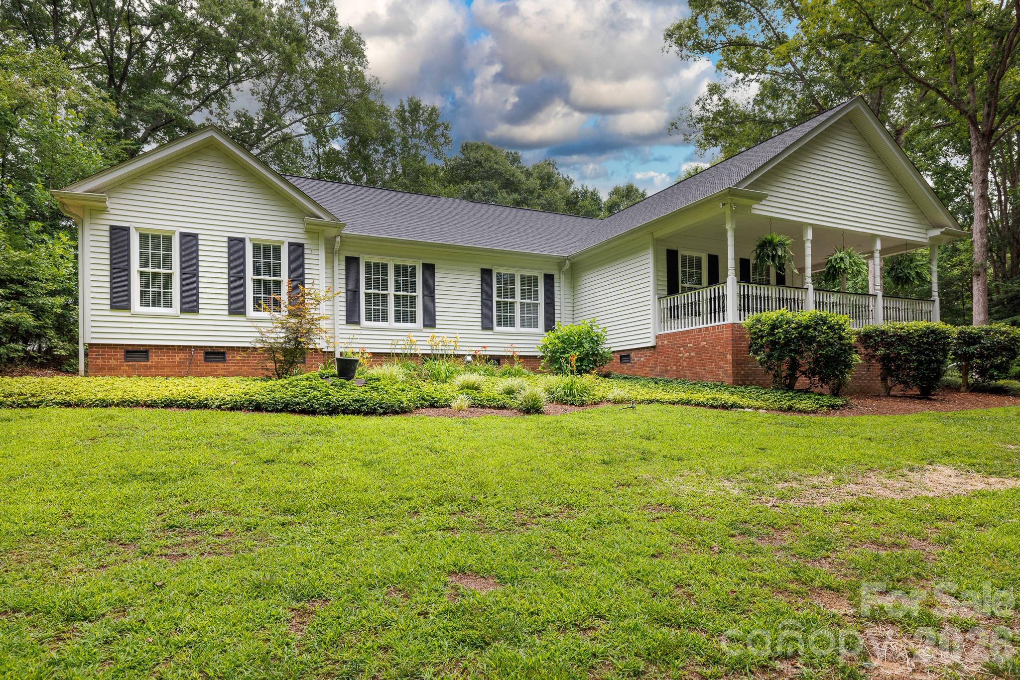Prepare to be amazed the second you pull up to 3540 Harmony Rd!! Theres been no detail not covered, this secluded prestine ranch home sitting on 2.7 ares will please the pickiest house hunters out there.From the beautiful landscaping and outdoor entertaining area to the amazing screened porch you'll never want to leave and if that wasnt enough take a step inside and see the beauty that awaits you there.  This home has been maintained like new with the spacious kitchen open to the living room for more entertaining this gem is sure to please.  Hurry to snag this before it gets gone!!!!!!You truly have to see to appreciate