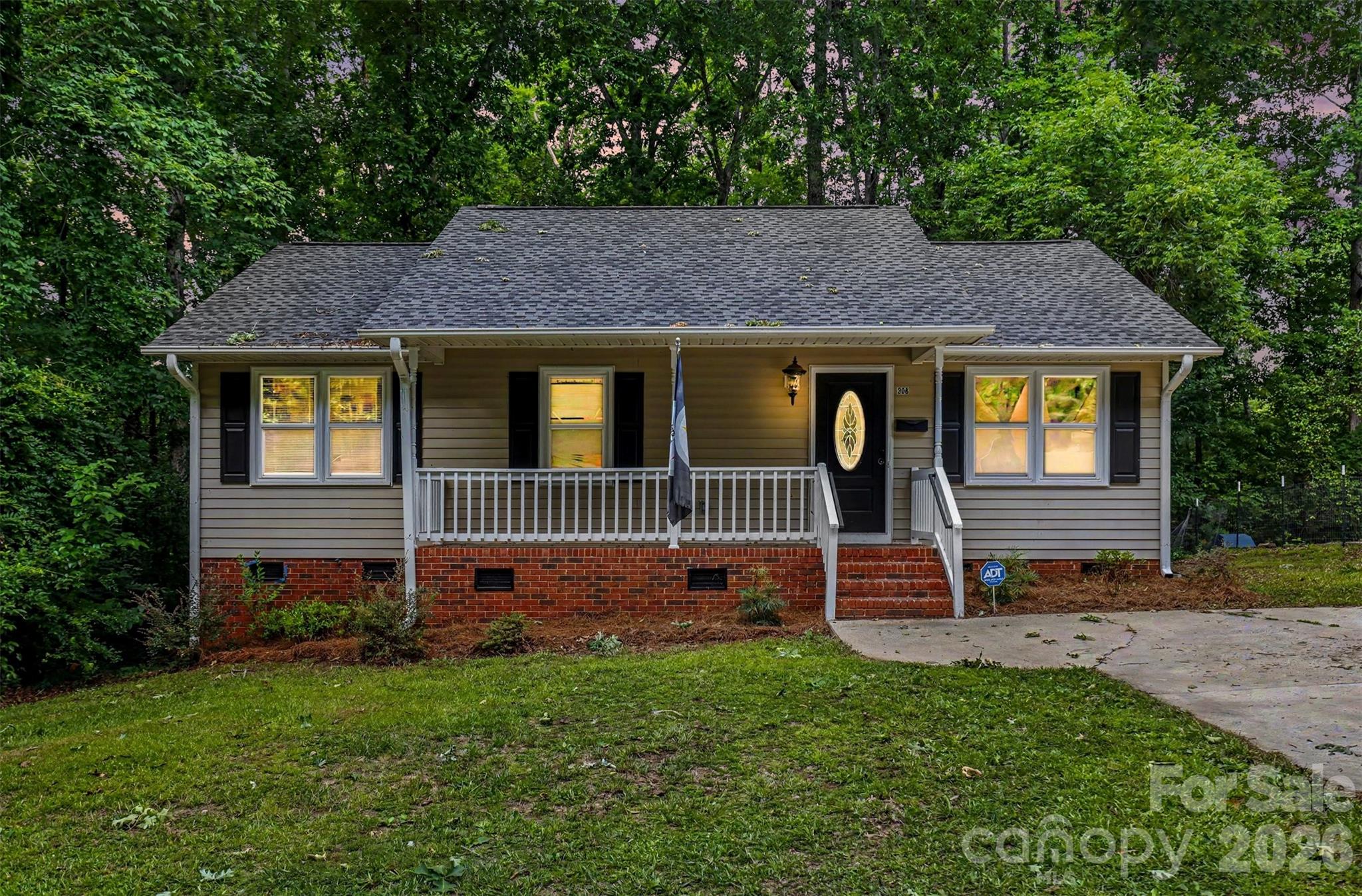 Move-in ready 3BR/2BA home on .47 acres with wooded backyard! Built in 1996, this home offers approximately 1,050 square feet, an inviting covered front porch, spacious rear deck, open living and dining areas, updated flooring, and plenty of outdoor space to enjoy. Conveniently located less than a mile from downtown Lancaster with easy access to Hwy. 9 Bypass and Hwy. 521 for commuting, shopping, and dining. USDA eligible for 100% financing (buyer qualification required), making this an excellent opportunity for first-time homebuyers or investors. Schedule your showing today!