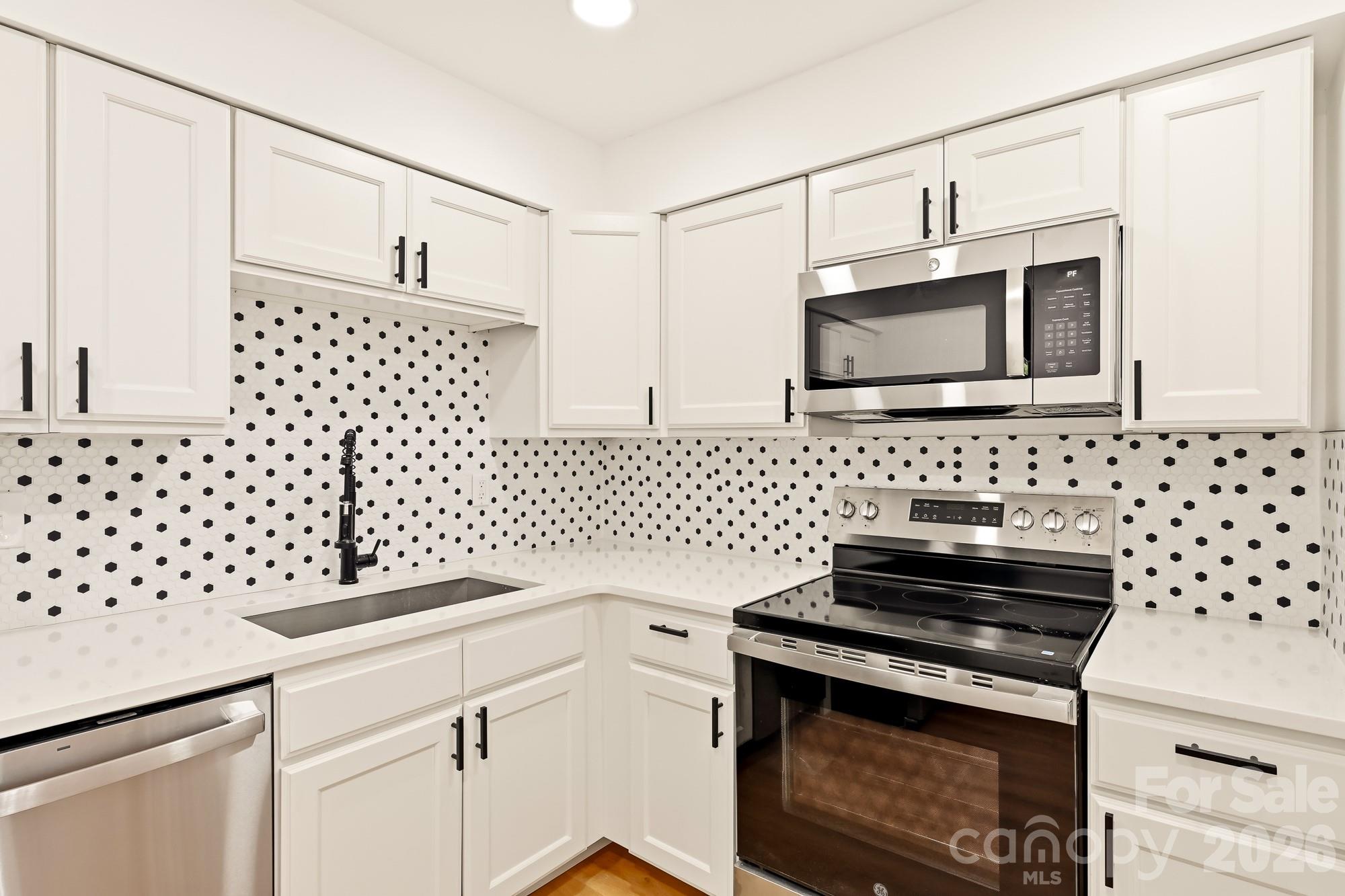 Completely renovated from top to bottom, this move in ready home offers the perfect blend of modern style and peace of mind with major system upgrades throughout. Exterior improvements include brand-new sliding, roof, gutters, HVAC system, and water heater. Inside, you'll find new luxury vinyl plank flooring throughout, a beautifully redesigned kitchen featuring new cabinetry, quartz countertops, stainless steel appliances, and a designer tile backsplash. The bathroom has been updated with a stunning designer-tile-shower, while new light fixtures, recessed lighting, ceiling fans, and updated door and cabinet hardware provide a fresh, contemporary feel throughout the home. As an added bonus, a brand-new privacy fence will be installed prior to closing once the home is under contract, allowing the buyer to enjoy a fully fenced yard at move-in.