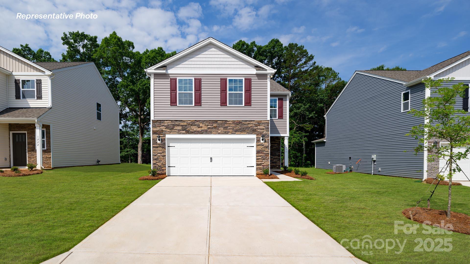 The Aisle is a spacious & modern two-story home designed with open concept living in mind. This home features four bedrooms, two & a half bathrooms & a two-car garage, making it perfect for your new home. Upon entering the home, you'll be greeted by an inviting foyer that leads directly into the heart of the home: the great room. This impressive space features a living room, dining area, and well-appointed kitchen. The kitchen is equipped with a pantry, stainless steel appliances, & a large island with a breakfast bar, making it perfect for both cooking and casual dining. Home also features a primary suite, complete with a large walk-in closet and en suite bathroom featuring dual vanities and a spacious shower. The additional three bedrooms share a full bath that includes dual vanities. Outback is a patio, perfect for outdoor entertaining or enjoying beautiful weather. With its thoughtful design, spacious layout, and modern conveniences, the Aisle is the perfect place to call home.