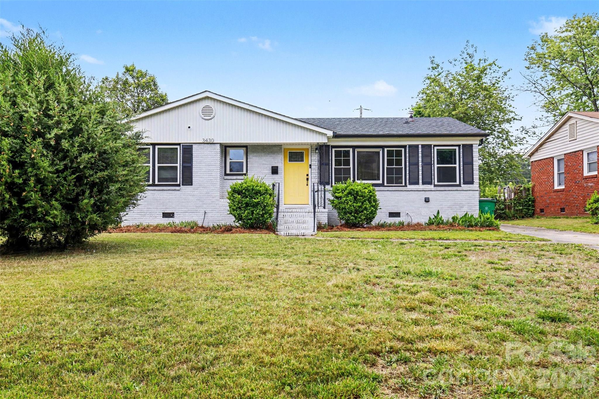 MODERN RANCH HOME IDEAL FOR INTOWN LIVING OR SHORT TERM RENTAL. Located in this up and coming neighborhood of Westerly Hills / Ashley Park, this beautifully remodeled 3-bedroom, 1-bath home offers the perfect blend of modern updates, character, and convenience — JUST MINUTES FROM UPTOWN CHARLOTTE, LOCAL PARKS & GREENWAYS, RESTAURANTS, BREWERIES AND SHOPPING.  Inside, you’ll find a bright open-concept layout featuring luxury vinyl plank flooring, recessed lighting, modern neutral interior paint, and an updated kitchen with granite countertops, stainless steel appliances, and an eat in dining area — ideal for entertaining and everyday living.  One of the standout features of the home is the expansive flex space offering incredible versatility to fit your lifestyle needs. Whether used as a spacious primary bedroom retreat or a large secondary living area, this room features a cozy gas fireplace, abundant storage with an oversized walk-in closet and custom built-ins, plus stylish double barn doors. The flexible floorplan still allows ample space for additional bedrooms and even a dedicated home office, giving buyers the ability to customize the layout to best suit their needs.  The spa-inspired bathroom features dual vanities with LED mirrors, a tile surround shower and a private water closet for added comfort and functionality.  A functional mudroom and separate laundry room with added shelving provide excellent storage and organization. MAJOR UPGRADES INCLUDE A NEWER ROOF, WINDOWS & HVAC (2018) offering peace of mind for years to come.  Step outside to enjoy the mature landscaping and private fenced backyard setting — perfect for relaxing, gardening, or entertaining guests. Perfect for home owners or investors alike this MOVE IN READY home offers the updates, convenience and lifestyle that homeowners and travelers are searching for.