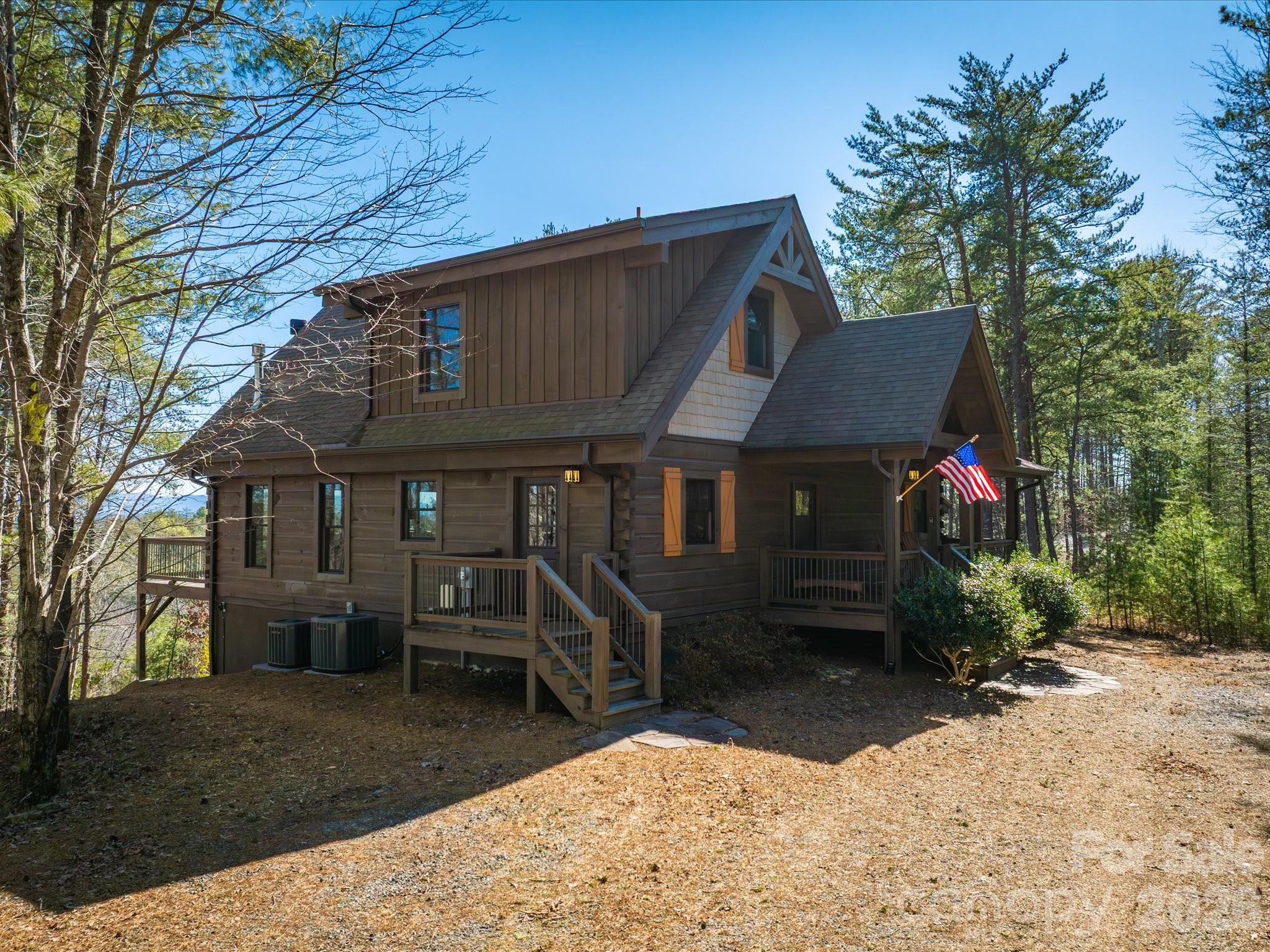 Your mountain retreat awaits in a gated community called Pisgah Preserve at Lake James: a charming 3-bedroom, 3.5-bath square log home on 1.92 acres, adjoining 21 acres of common space that offer privacy and room to roam, with a finished basement that includes an exercise room (potential 4th bedroom), a dedicated entertainment area, office, full bath and a generous utility room for storage and projects. Two expansive decks—one particularly inviting and accessible from the primary suite—invite sunlit mornings and tranquil evenings, while a soaring living room features large windows and double sliding doors that open fully to the deck, framing sweeping views of South Mountain. The contemporary rustic design centers on a gourmet-style kitchen with custom cabinets and granite countertops, complemented by exposed wooden beams spanning the ceiling and a cozy propane standing fire stove that provides ambiance and reliable secondary heat. The main level hosts the primary bedroom and bath, a walk-in closet, the dining area, a laundry room, and a convenient half bath, while upstairs offers two bedrooms and a full bath for family or guests. The finished basement expands living space with an entertainment hub, an office for remote work or study, a full bath, and a standalone utility room that keeps systems neatly tucked away. Built with evident craftsmanship by The Powell Group, the home blends rugged mountain character with modern comfort, and it sits just steps from Pisgah National Forest—teeming with half a million acres of hiking, hunting, and camping opportunities. Lake James, Paddy’s Creek State Park, Fonta Flora Park, and Fonta Flora Brewery are all within 1–2 miles, with nearby wineries adding tasteful diversions after days of outdoor adventures. The property also features community amenities—a reading cabin, a fire pit, and a covered pavilion—that enhance a sense of belonging and a resort-like ease. Whether you’re seeking a year-round residence, a vacation haven, or a turnkey VRBO/Airbnb investment, this mountain escape offers stunning views, seamless indoor-outdoor living, and an invitation to savor every season in this picturesque corner of the mountains.