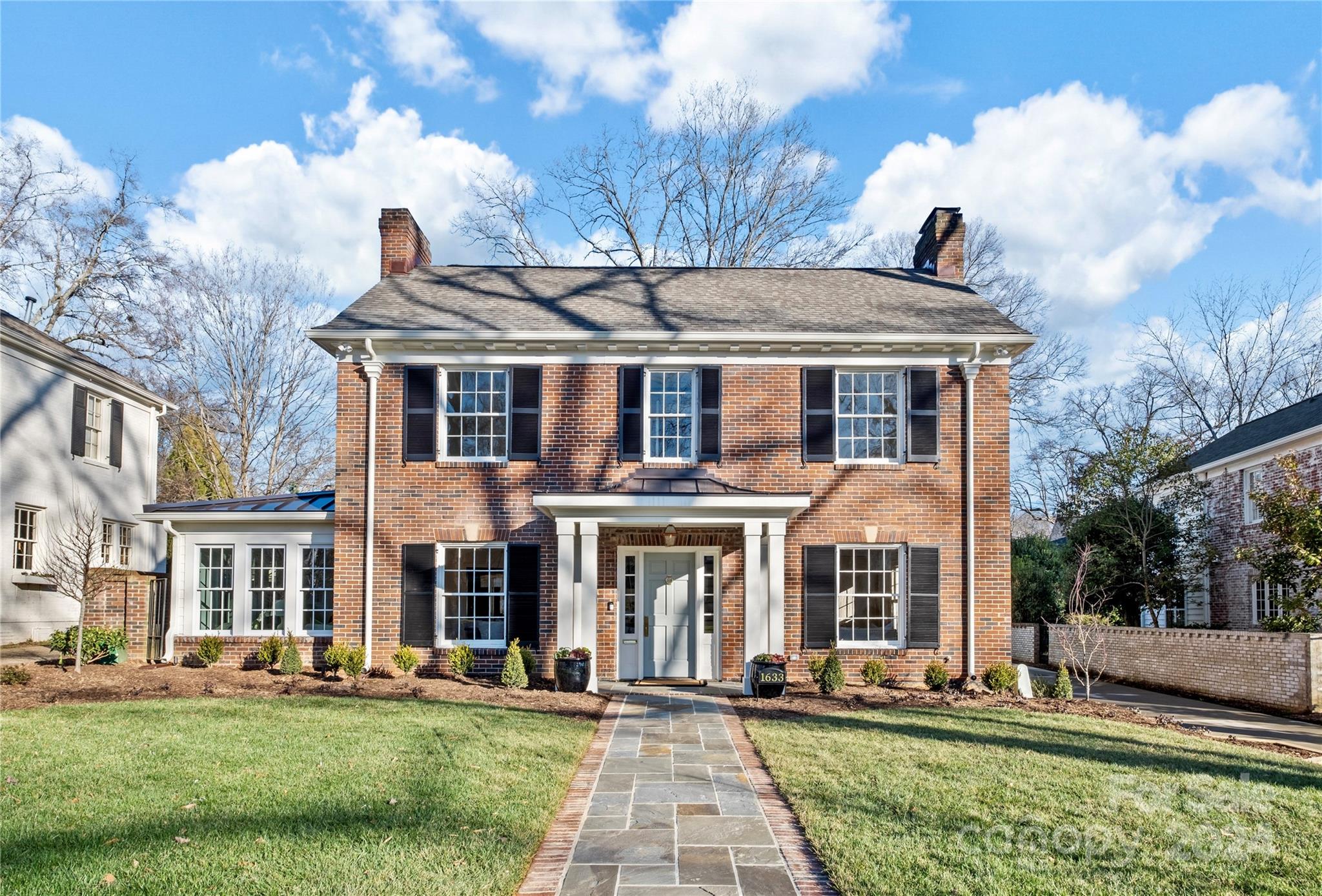 Exquisite Myers Park home has been completely renovated top-to-bottom 2023/2024! Masterful transformation by Joyce Building Co, 1633 Beverly effortlessly blends modern conveniences with original charm. Designer fixtures and finishes throughout! Beautiful refinished hardwoods and moldings. Elegant front formal rooms plus popular open floorplan- expansive family room opens to the gleaming Chef’s kitchen. Kitchen features marble countertops and backsplash, large center island, abundance of custom cabinetry, high-end appliances incl. gas range with custom hood and large scullery. Sunny breakfast area. Bar area with decorative glass cabinets and butcher-block countertops. Sunroom/office behind hidden paneled door and functional mudroom/laundry off side entrance! Primary suite with 2 walk-in closets and incredible spa-like bath featuring soaking tub, dual vanities, and walk-in marble shower. Rear brick patio overlooks the picturesque yard. All new roof, plumbing, electrical, and HVAC.