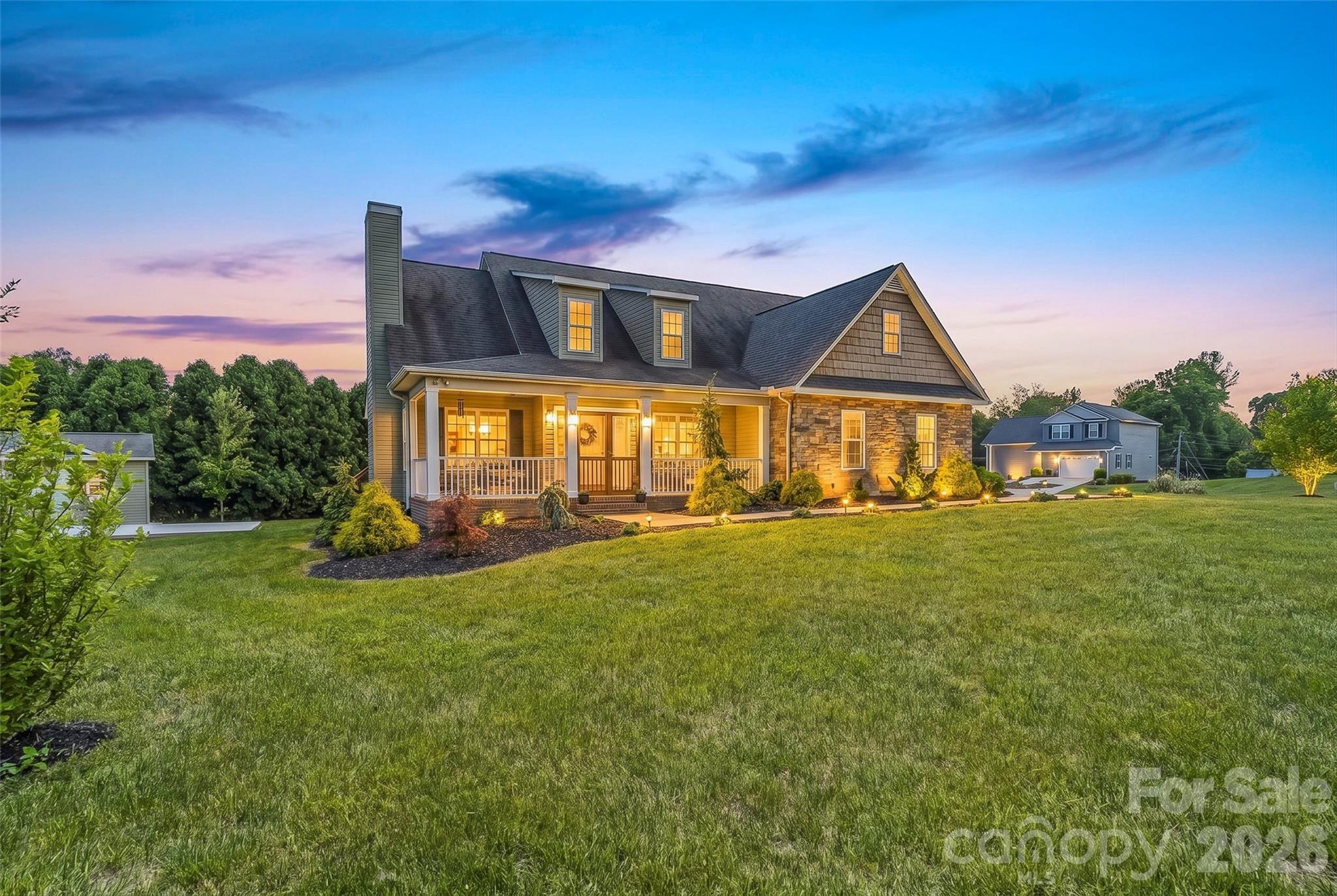 This absolutely stunning and immaculate 4BR/3BA home in the Hudson area features an amazing screened in front porch, a gorgeous open floorplan, fresh paint throughout the interior, and updated appliances--all located on a corner lot! Custom screened-in front porch offers instant curb appeal and the perfect place to relax on warm, southern nights! Beautiful hardwoods flow through the main level. The large living room offers high ceilings, a fireplace, and large windows. The open floor plan flows into the large dining area. The kitchen features bar seating, beautiful wood cabinets, a spacious breakfast nook, new stove and microwave, along with a pantry. Primary bedroom on main level is large with tray ceilings and walk-in closet. Primary bathroom has been updated with a new tiled walk-in shower and updated mirrors/lighting. Two more bedrooms on the main level along with a second full bath. Under stair storage, multiple linen closets and a huge attic equal an incredible amount of storage space! Upper level offers a fourth bedroom and easy attic access. New back deck overlooks the matching 12x18 storage building that will remain and a new 12x16 concrete slab, ready for a pergola or hot tub! Located only minutes from shopping and dining and in a charming and desirable neighborhood. EV hook-up. Don't wait to schedule your appointment to see this beautiful home!