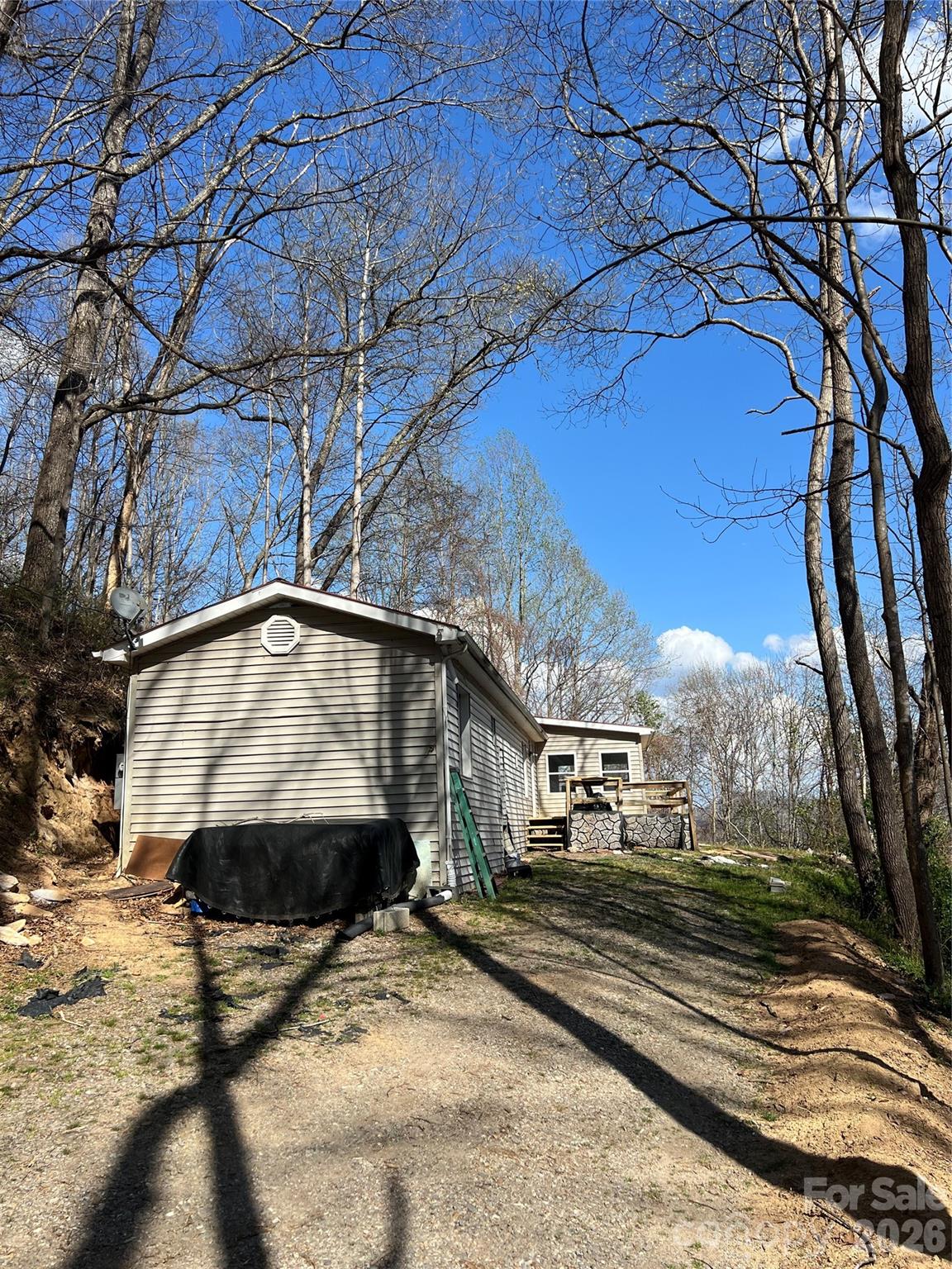 CASH deal. Investor opportunity in a prime Waynesville location! This property offers incredible potential for the right buyer looking to renovate and add value. Situated in a desirable area, the property features a beautiful mountain view that can be enjoyed year-round. With some TLC, this home could be transformed into a great primary residence, rental, or investment property. Conveniently located near shopping, dining, and all that Waynesville has to offer.