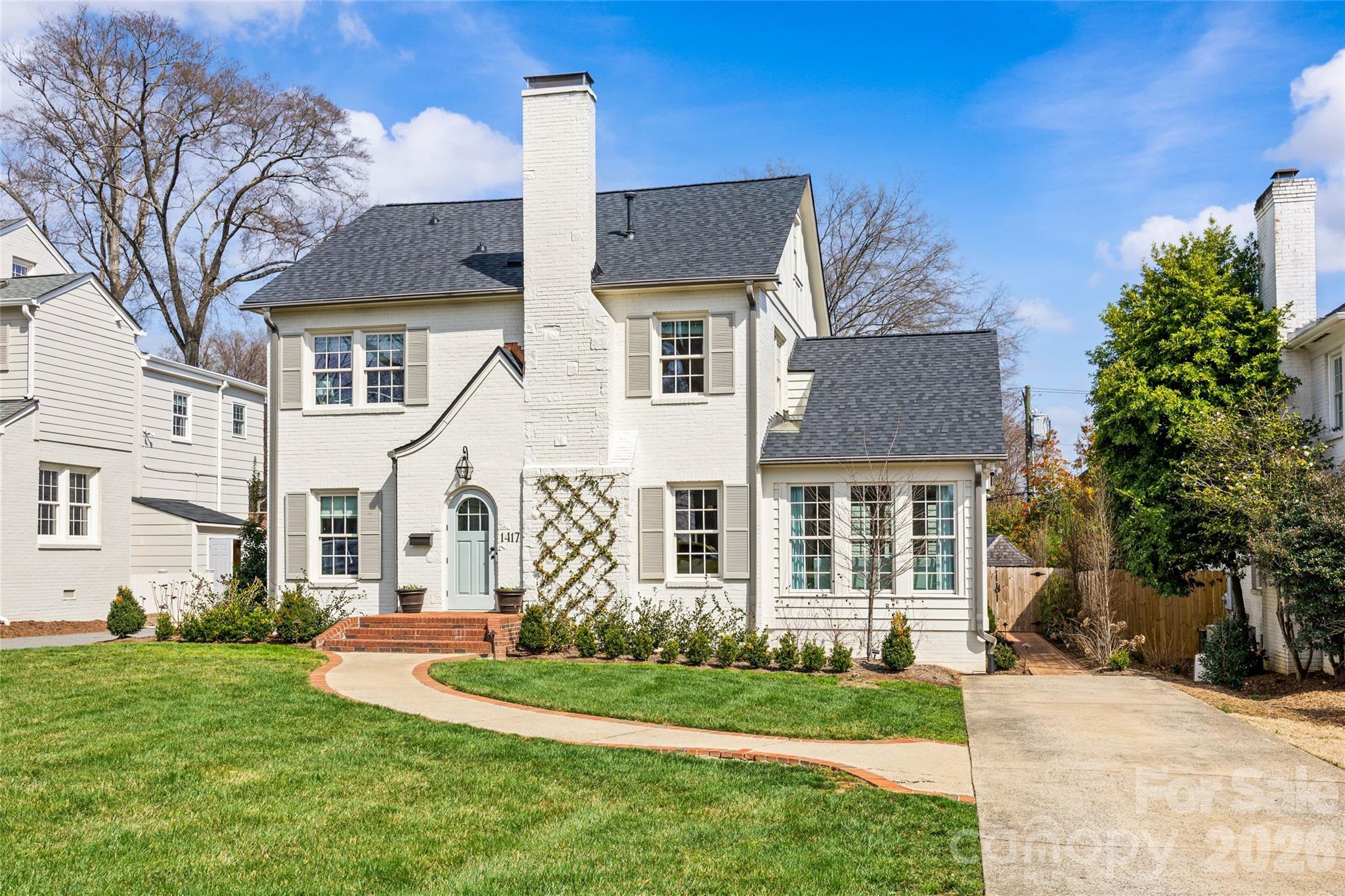 A masterful renovation, this home exudes timeless appeal through classic design elements with modern updates for today's lifestyle. Entertain across three living spaces with an open kitchen/breakfast/family room leading out to a screened in porch and turf yard complete with hardscape patio and Hillbrook garden house. Chef's kitchen includes Subzero french door refrigerator/freezer and a 6-burner gas Wolf range with oversized eat-in island and sunny breakfast area. The renovated primary suite is a personal oasis with sitting room and attached "nanny suite" currently being used as a home gym with additional full bath. Three additional bedrooms and two full bathrooms complete the second floor. The third floor walk-up bonus/attic is fully finished with an attached full bathroom. No stone was unturned on this home including: tankless water heater, sealed crawl space, new roof and gutters, all new HVAC systems, new windows and doors, vented gas logs, and more. Too many details to list, see attached Features Sheet. Where exceptional updates meet timeless charm — a truly standout residence in one of Charlotte's most coveted neighborhoods.