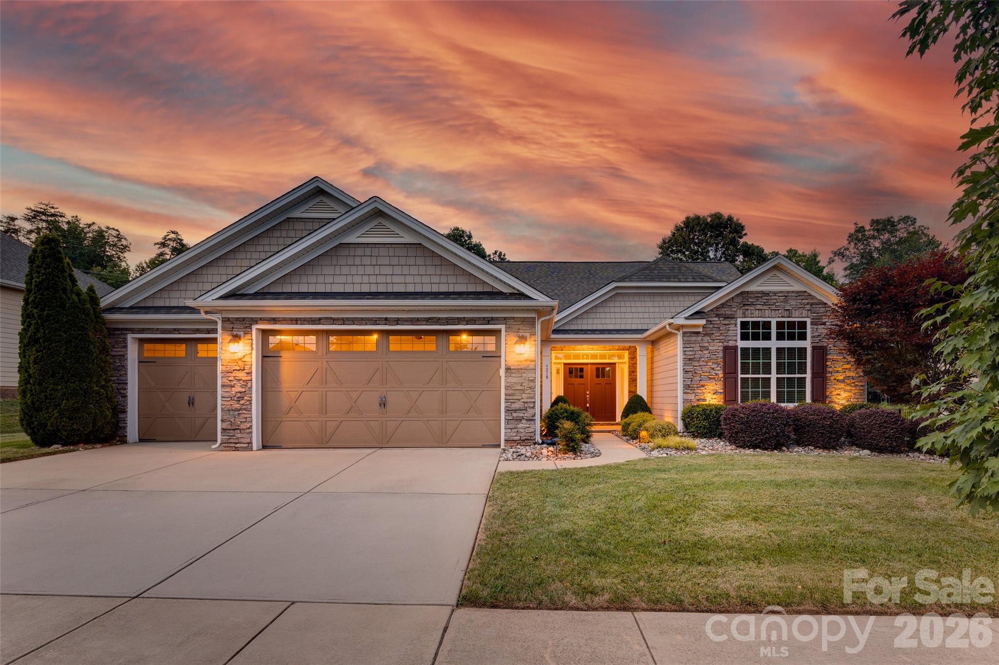 Welcome to 5218 Casper Drive, a beautifully upgraded home on a private, premium lot in the highly desirable Vineyards on Lake Wylie community. Offering nearly 2,200 square feet of thoughtfully designed living space, this 3-bedroom, 2.5-bathroom home blends modern style, everyday comfort, and exceptional functionality.
Inside, upgraded hardwood flooring flows throughout the home, creating a warm and cohesive feel. The open-concept floor plan is ideal for both entertaining and daily living, with a bright, spacious kitchen that seamlessly connects to the main living area. A built-in desk adds both charm and practicality, making it the perfect workspace or organization hub.
The home also features generously sized bedrooms, a breakfast area, and flexible living spaces that can easily adapt to your needs. A spacious 3-car garage provides ample room for vehicles, storage, or a workshop and includes a convenient access door to the backyard. An extended covered patio with a natural-gas line for grilling and an irrigation system for the professionally upgraded landscaping adds to the functionality of this home.
Living in The Vineyards means enjoying resort-style amenities, including a new clubhouse, multiple outdoor pools with a dedicated lap pool, boat slips, boat and RV storage, playgrounds, walking trails, pickleball courts, and more. Ideally located, the community offers easy access to shopping, dining, major highways, the U.S. National Whitewater Center, Charlotte Douglas International Airport, and Uptown Charlotte
Move-in ready and filled with thoughtful upgrades, 5218 Casper Drive offers the perfect combination of comfort, convenience, and an outstanding lifestyle. Photos and Measurements to be added.