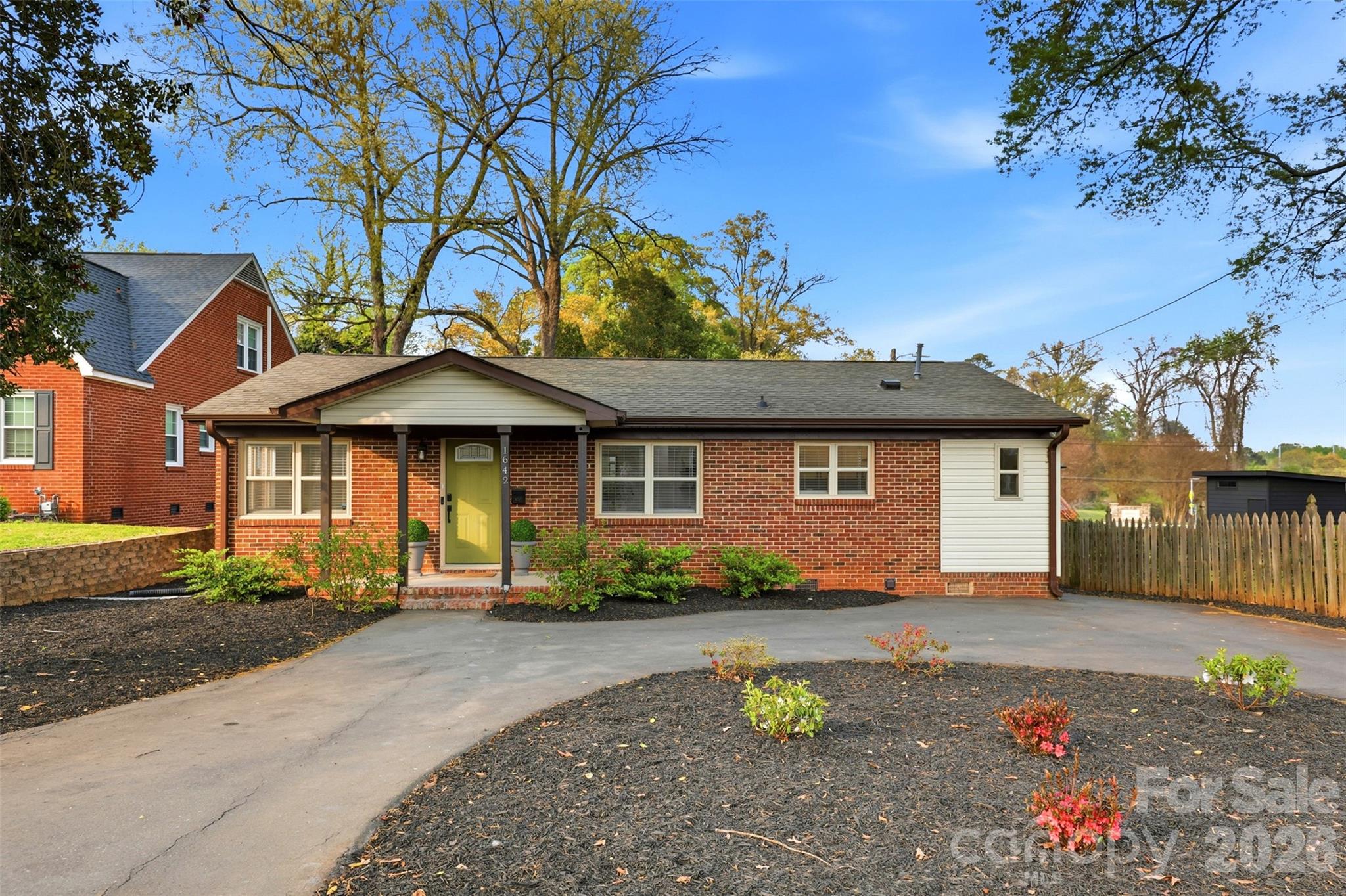 This home qualifies for 100% financing programs! Welcome to 1642 Washington Avenue - a fully updated 3-bedroom, 2-bathroom brick ranch in the historic McCrorey Heights neighborhood of Charlotte, NC. Classic curb appeal meets modern living in one of the city's most exciting and up-and-coming addresses. Inside, an open-concept layout creates a natural flow from the living area to the kitchen, which features stainless steel appliances and plenty of room to cook and gather. The big-ticket items are already handled - a 2019 roof and 2023 heat pump and HVAC system mean you can move in with complete confidence. Out back, a beautiful deck overlooks a flat, fully fenced yard- the kind of private outdoor space that's hard to come by this close to the city. And the location is unmatched. Just one mile from the booming Camp North End district and five minutes to the heart of Uptown Charlotte, you're perfectly positioned to enjoy everything this city has to offer - without sacrificing the charm of an established, walkable neighborhood.