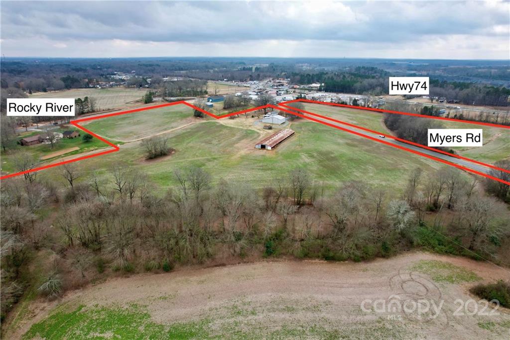 City water on site and sewer can be requested from the City of Monroe. Minutes to the Monroe Bypass and 800 feet away to Highway 74. Current zoning has 30+/- acres zoned CC-MX1. Numerous possibilities exist. Parcel numbers include #09336018, #09336018C, 09336018G