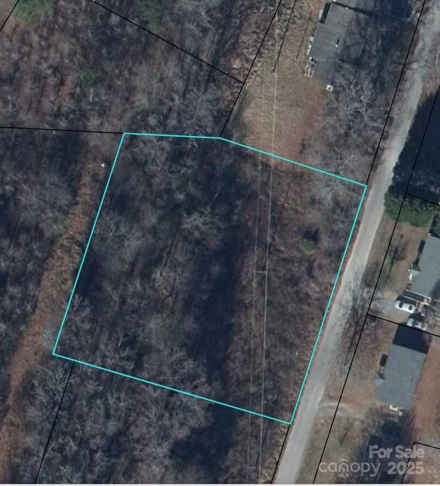 UPDATED PRICING on this Prime Vacant Lot in the Heart of Clover!

Discover the perfect location to build your new home or investment property! Just minutes from downtown Clover, this versatile lot is ideal for a starter home, downsizing, or expanding your real estate portfolio. Whether you envision a site-built or modular home, this property offers the flexibility to suit your needs. Located in the highly sought-after Clover ISD, this is an opportunity you won’t want to miss. Take a closer look and bring your vision to life!