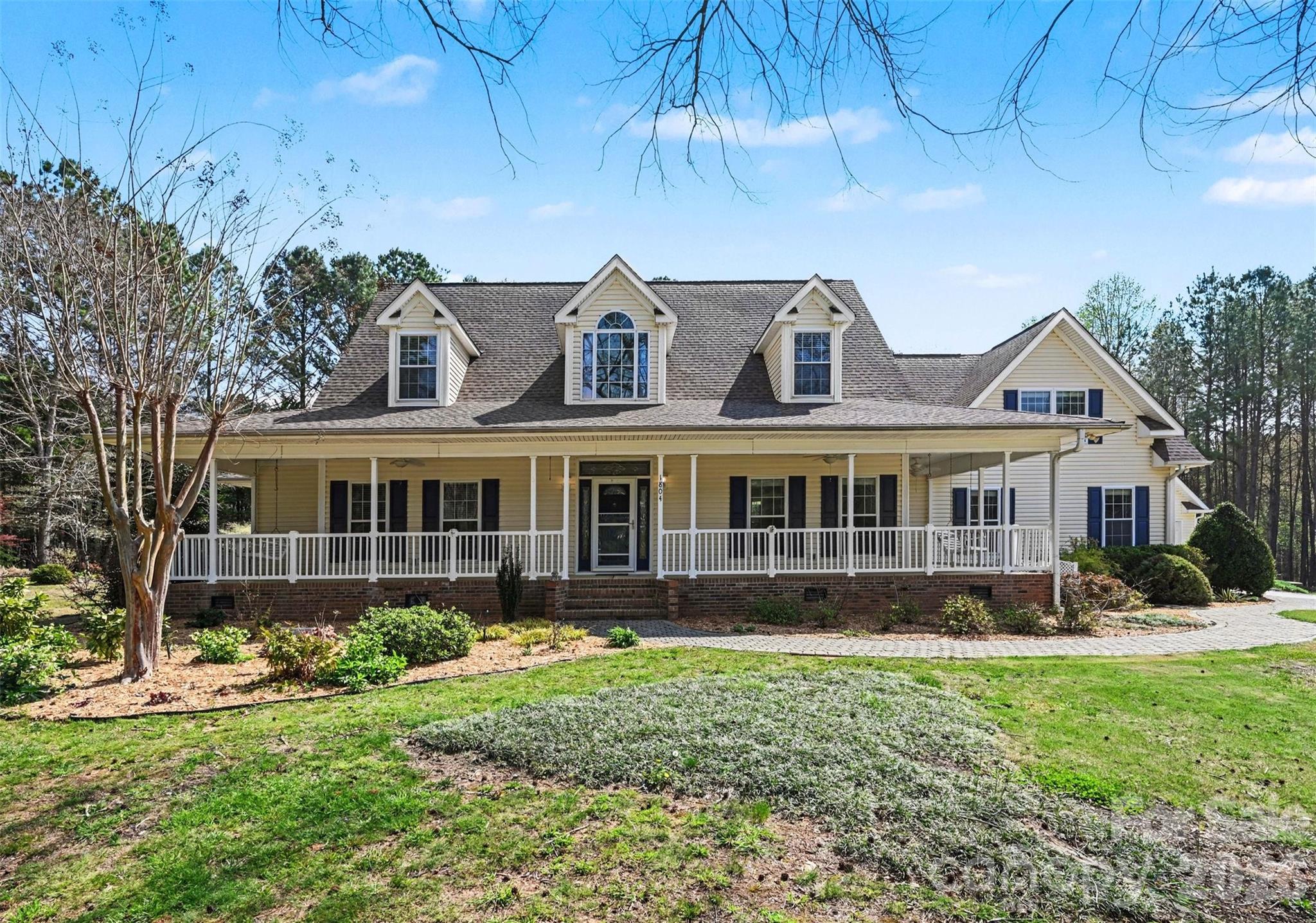 Tucked away on a quiet, peaceful, and private 2+ acre cul-de-sac lot, this property offers space, privacy, and a setting that’s getting harder to find. From the moment you arrive, the home stands out with inviting curb appeal, enhanced by years of thoughtfully cultivated landscaping filled with mature flowers, trees, and greenery, along with covered front and back porches perfect for relaxing or entertaining.
Inside, you’ll find a spacious layout with the primary suite and a secondary bedroom on the main level, plus two oversized bedrooms upstairs. The primary suite features beautiful bay windows and a comfortable retreat feel.
Step outside to your own backyard escape with an in-ground pool, plus a detached 2-car garage/shop with unfinished space above—ideal for storage, a workshop, or future expansion. Located in a community with scenic equestrian trails, this home blends quiet, peaceful living with everyday functionality.