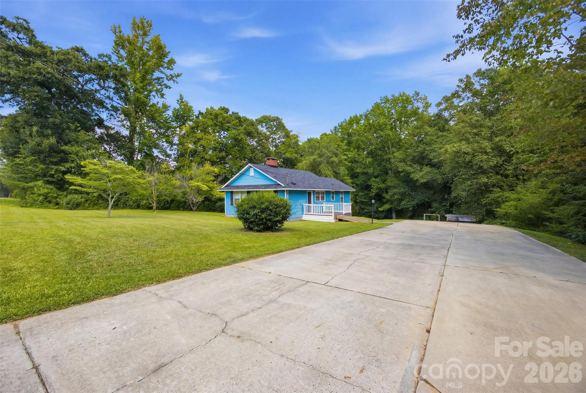 Welcome home to this beautifully updated 3-bedroom, 1-bath home situated on an over an acre lot in the heart of Lancaster. Blending classic charm with modern updates, this inviting property features hardwood flooring, stylish light fixtures, refreshed kitchen cabinetry, and a beautifully remodeled bathroom complete with granite countertops and a ceramic tile shower.

Enjoy your morning coffee or unwind in the evenings on the screened porch overlooking the spacious, private backyard. With over an acre of land, there's plenty of room for gardening, entertaining, pets, or simply enjoying the outdoors. A storage building provides additional space for tools, lawn equipment, or hobbies.

Whether you're a first-time homebuyer, looking to downsize, or searching for a move-in ready investment, this home offers comfort, convenience, and room to grow, and all just minutes from shopping, dining, and everything Lancaster has to offer. Don't miss your opportunity to own this charming property with the rare combination of updated living and expansive outdoor space!