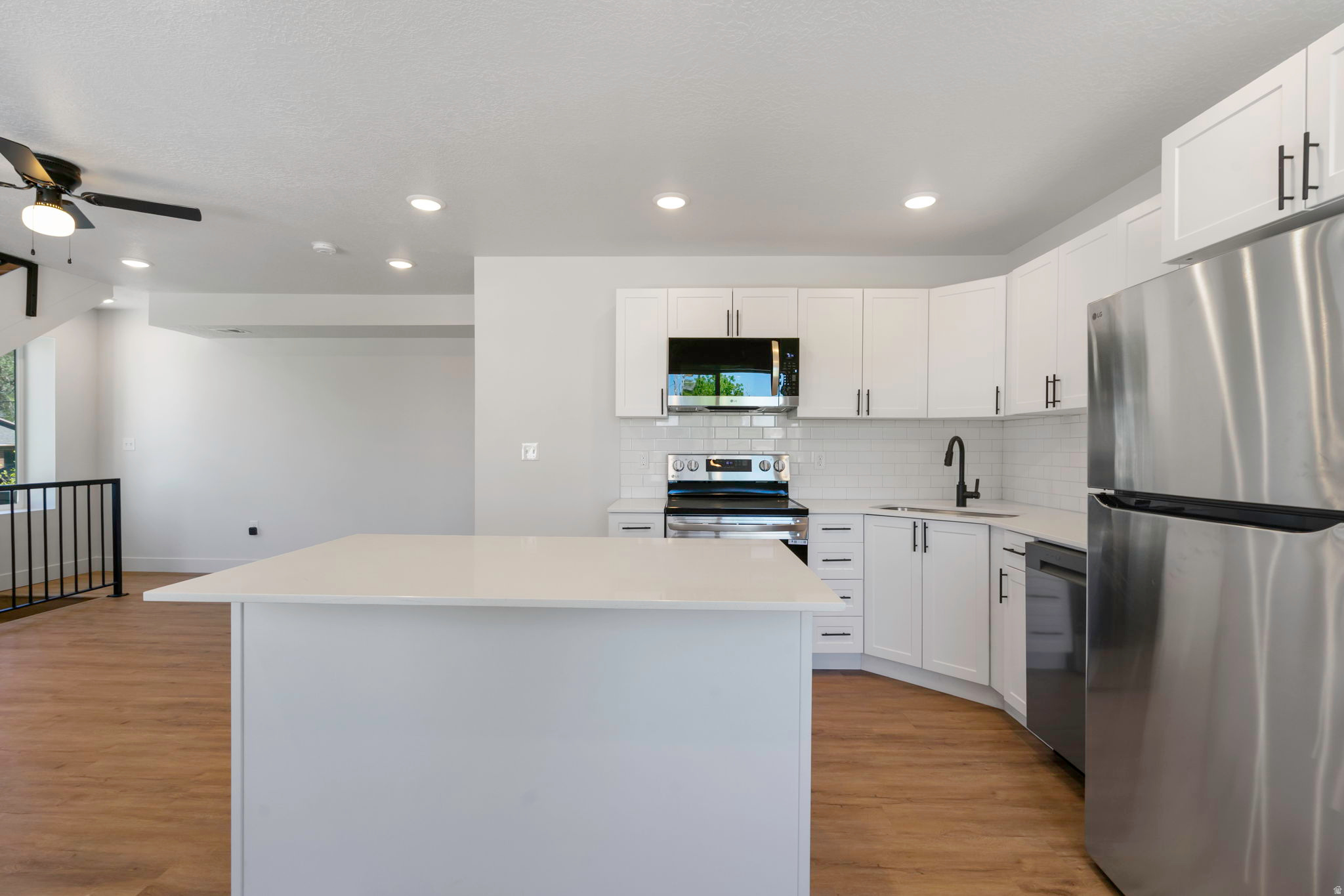 Tucked just off the street, Sycamore Townhomes offer a rare combination of peace, natural light, and a functional layout. This brand-new 3-bedroom home is designed for everyday living. The main floor features an open and airy layout. Upstairs, both bedrooms and the laundry are conveniently located together, making daily routines simple and efficient. Washer and dryer are included, adding immediate value and ease on move-in day. Natural light fills the home, highlighting clean finishes and durable laminate flooring throughout. This home includes a 2-car garage that is wired for an EV Charger and is positioned in a quieter setting away from main road traffic. Residents can also enjoy a shared grassy picnic area, perfect for relaxing or gathering. Conveniently located near the high school, restaurants, a grocery store, and a gas station, these townhomes offer both comfort and accessibility in one well-designed package. There are 7 townhomes available with 2 or 3 bedrooms. Contact Kim for more info.