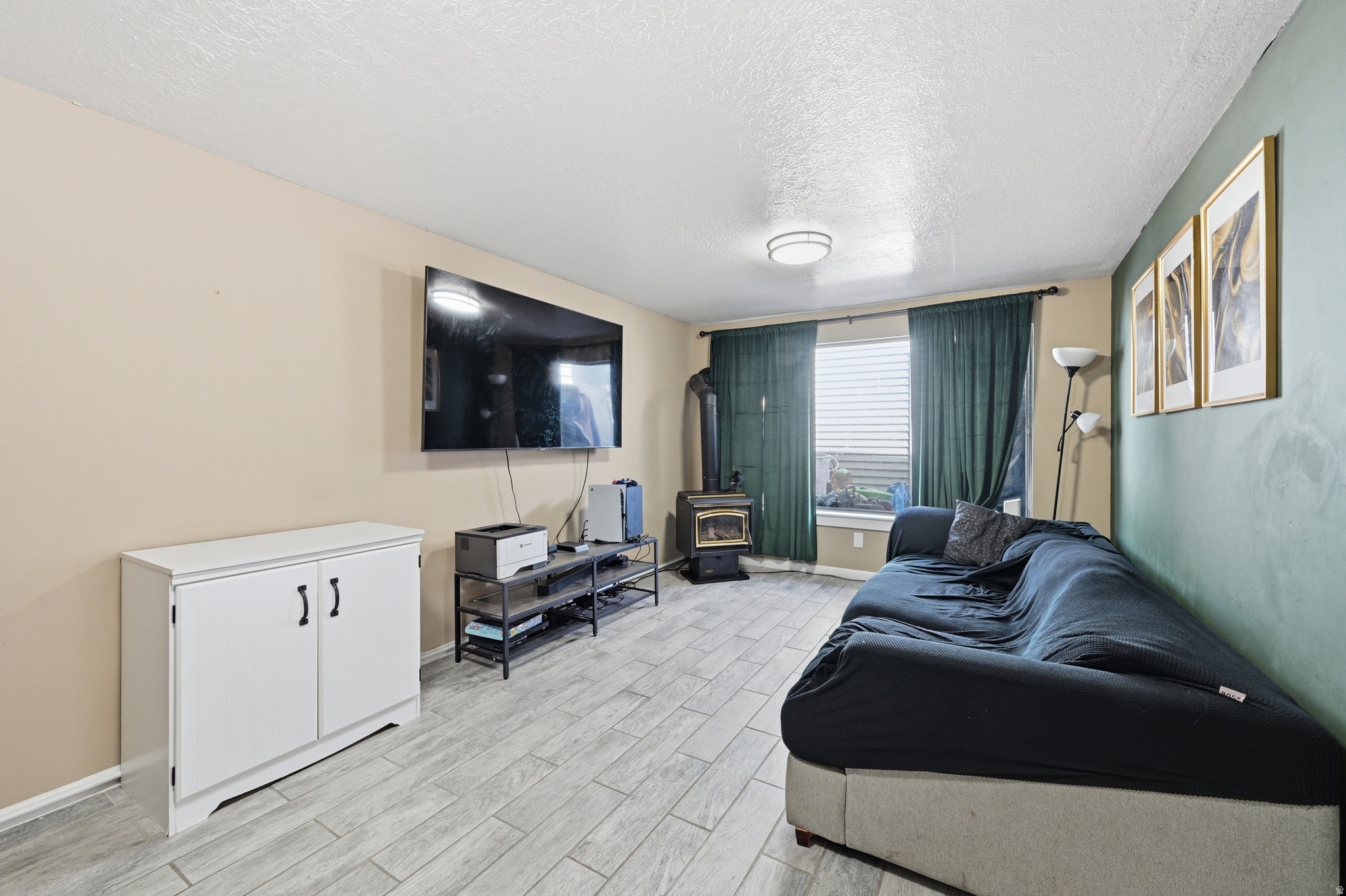 THIS HOME MORTGAGE IS ASSUMABLE WITH A SMALL AMOUNT BETWEEN THE ASKING PRICE AND THE PAYOFF & AT 3.625% RATE, THIS PLACE CAN'T BE BEAT!!!!!  Great Investment Property.  Ready for that established investor or first time buyer. Charming 3-bedroom, 1.75-bath (could be a full bath) condo that's perfect for first-time buyers! New Water Heater (2024), New Carpet, Stainless Steel Appliances, Ventilation upgraded, This cute home offers a private patio, generous front green space, and easy access to everyday amenities.  Close to I-15 and Highway 89.  Enjoy being within walking distance to restaurants, grocery stores, and a convenience store, plus a nearby park with a basketball court. Andy Adams Reservoir close by.  Skip the rent and start building equity in a place you can call your own!