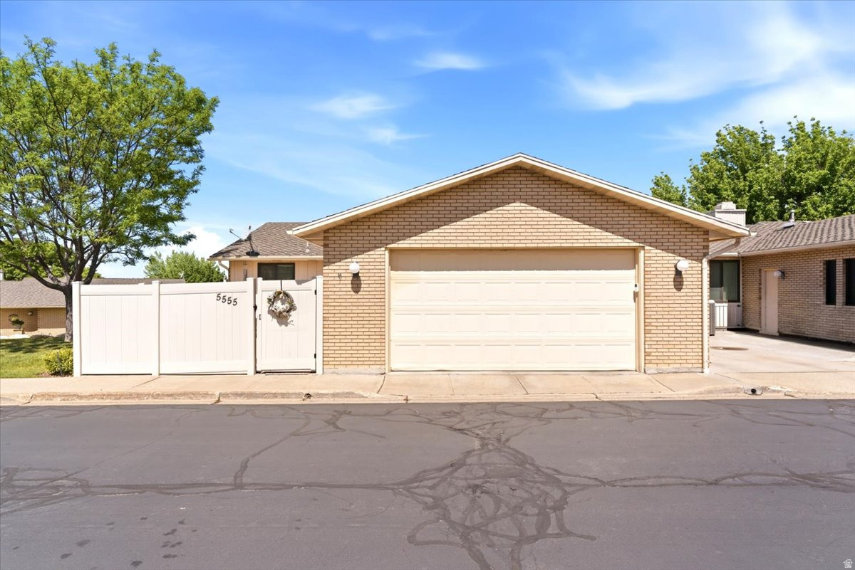 Beautifully updated 3-bedroom, 3-bath home offering  3,183 sq ft in this great South Ogden location , with quick access to both Weber and Ogden Canyons for endless year-round outdoor recreation. Conveniently located near shopping, dining, entertainment, hiking, biking, skiing, reservoirs, and commuter routes. This home features extensive upgrades throughout including a new high energy efficient HVAC installed Nov. 2025, double-pane windows, stunning primary bathroom remodel (3 yrs.) featuring a large walk-in shower with marble surround, new flooring, vanity and a 50-gallon water heater. The gorgeous remodeled kitchen with dark tone, durable waterproof LVP flooring was completed within the last 2 years and includes elevated ceilings, soft-close cabinetry, updated electrical, modern dimmable lighting throughout including under-cabinet lighting, HDMI plug-in at the island, induction oven/range, dishwasher, and contemporary finishes designed for both style and function. Additional recent upgrades include 24" blown-in insulation, a second remodeled full bath with marble surround and extra-deep soaking tub, upgraded electrical panel, patio coating, and roof heat tape. You will appreciate  the option of both gas and wood-burning fireplaces along with washer/dryer availability on both levels for added flexibility and convenience. HOA amenities include a community pool, partial landscaping, lawn care, snow removal, and low monthly fees.  A thoughtfully updated home in an exceptional location with comfort, functionality, tons of storage and access to everything Weber County living has to offer! We invite you to COME & SEE!  Square footage figures are provided as a courtesy estimate only and were obtained from county records.  Buyer is advised to obtain an independent measurement.