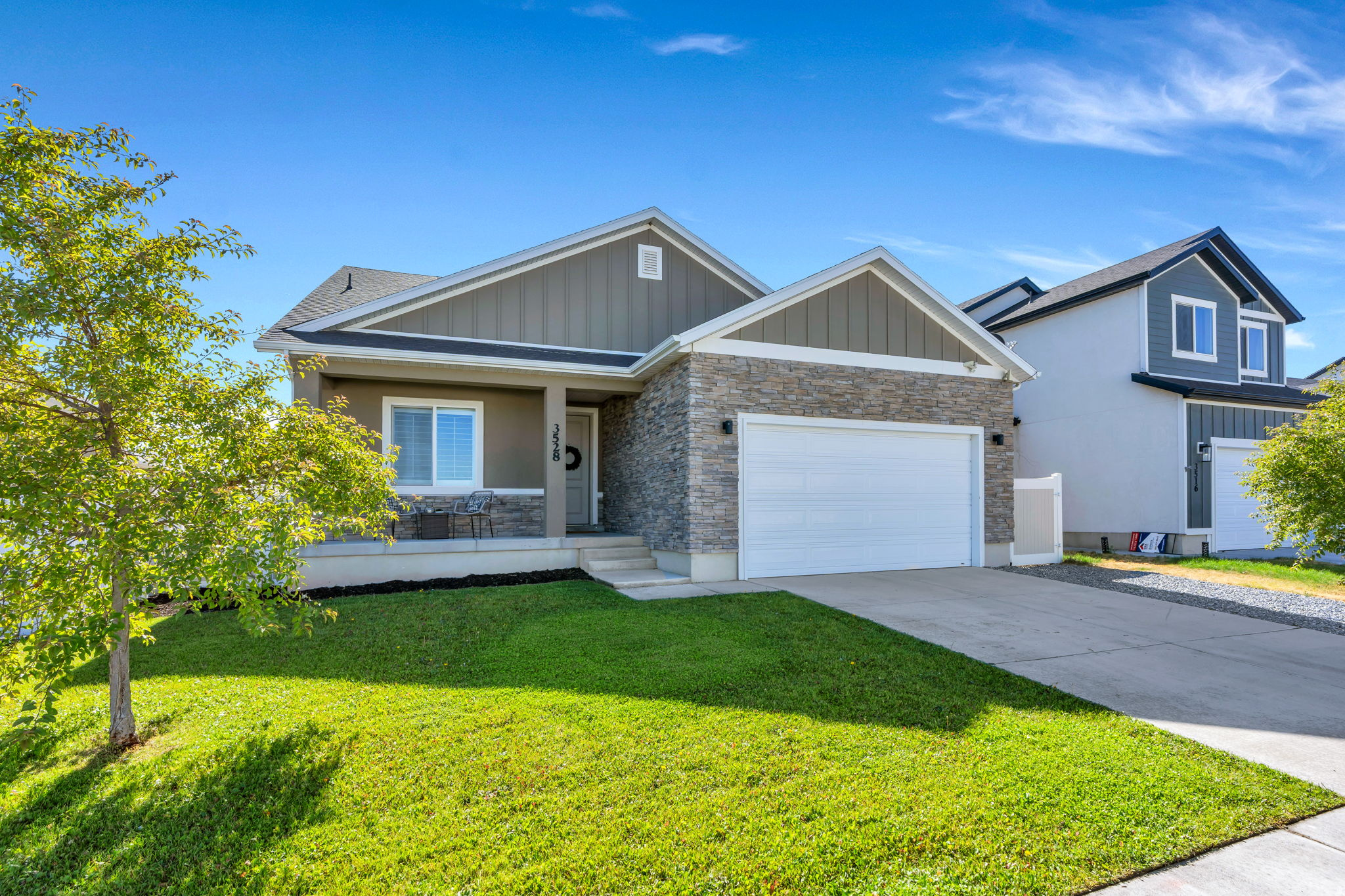 Beautifully finished and move-in ready, this 4,000+ sq ft home offers incredible value in one of Eagle Mountain's most desirable neighborhoods. Enjoy the rare convenience of a main-floor primary suite, dedicated office, and two full bathrooms. The spacious open kitchen, dining, and living area is perfect for entertaining with granite countertops, soft-close two-tone cabinetry, plantation shutters, and 9' ceilings. The west-facing backyard offers evening shade, a deck, patio, new sod, and no neighbors directly behind for added privacy. The basement is already framed with electrical completed, making it easy to finish and build instant equity with space for additional bedrooms, bathrooms, a large family room, or even a second kitchen. Enjoy nearby parks, trails, schools, shopping, and exceptional HOA amenities including a clubhouse, fitness center, arcade, and playground. Square footage figures are provided as a courtesy estimate only and were obtained from county records. Buyer is advised to obtain an independent measurement.
