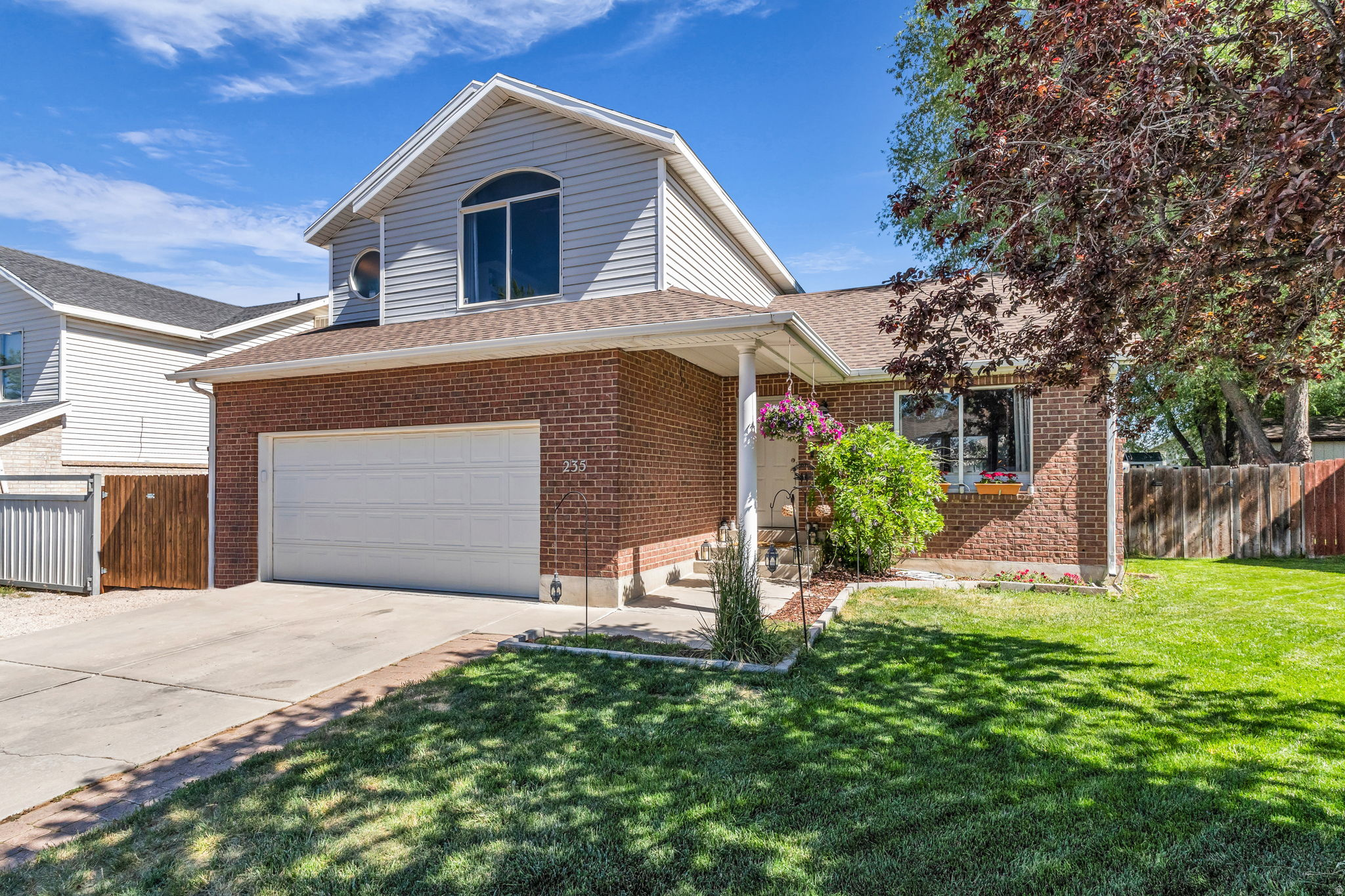 Located in one of Heber Valley's most welcoming neighborhoods, this charming home offers the perfect blend of comfort, convenience, and community. Situated adjacent to a neighborhood park, residents enjoy easy access to open green space where children can play, ride bikes, and gather with friends, while neighbors come together for barbecues, community events, and outdoor recreation. Inside, the home features a spacious main living area with vaulted ceilings that create an open and inviting atmosphere, ideal for everyday living and entertaining. The functional floor plan includes a comfortable primary suite with an ensuite bathroom, providing a private retreat at the end of the day. Additional highlights include a two-car garage and RV parking, offering flexibility for vehicles, trailers, recreational toys, and additional storage. The fully fenced backyard provides a private outdoor oasis complete with mature trees, lush lawn, and a gazebo--creating the perfect setting for outdoor dining, summer evenings, pets, and family gatherings. Whether enjoying a quiet morning coffee or hosting friends and family, the backyard offers a peaceful extension of the home's living space. Conveniently located just minutes from shopping, dining, schools, and historic downtown Heber City, the property provides easy access to everyday amenities while maintaining the charm and relaxed pace that make Heber Valley such a desirable place to live.