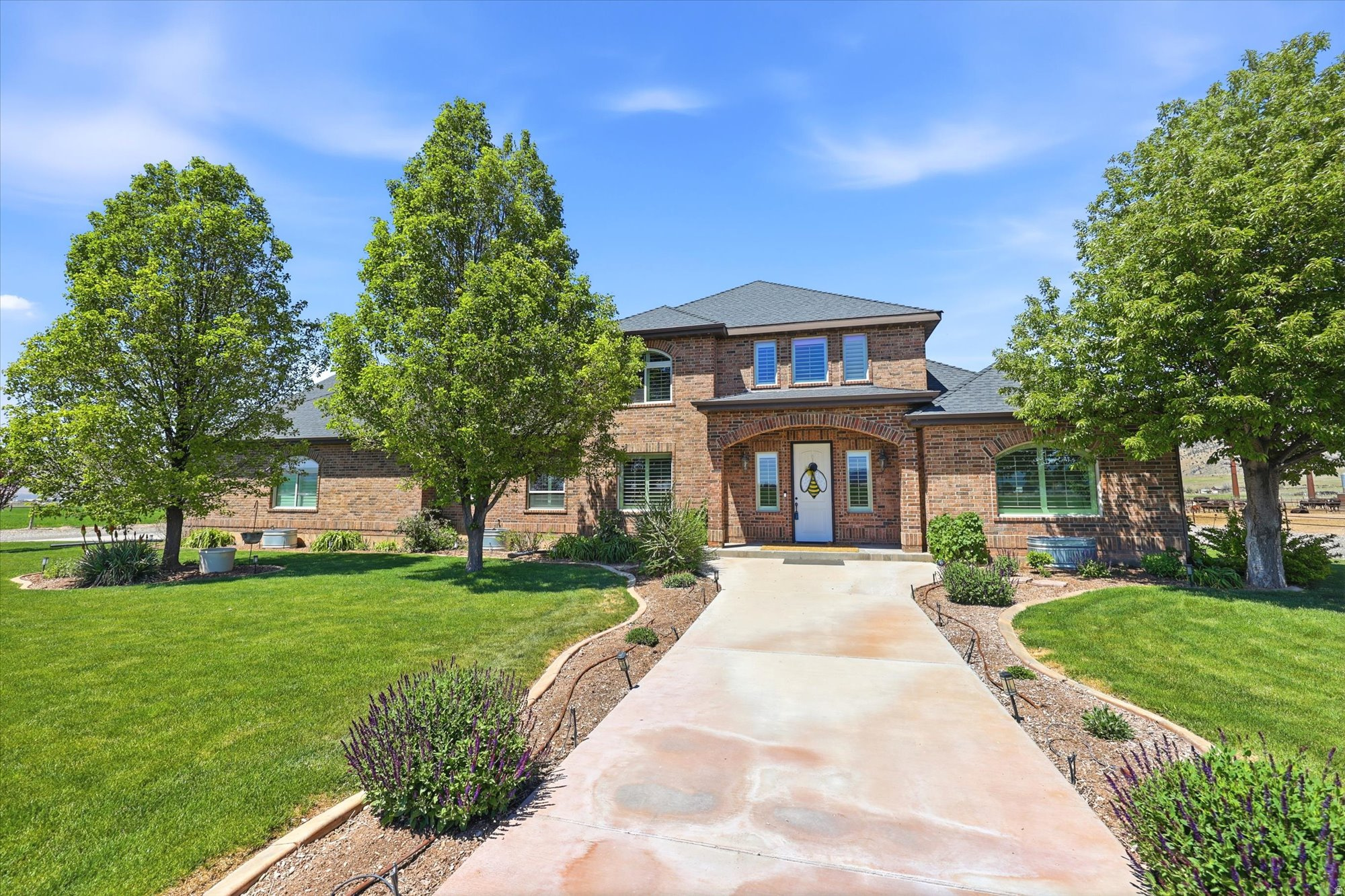 Nestled on a wide open horse property with breathtaking space and privacy, this custom-built home offers the perfect blend of comfort, functionality, and country living. Exceptionally well maintained and thoughtfully designed, the home features a spacious layout with plenty of room to gather, entertain, and enjoy the surrounding views. Outbuildings are included, providing endless possibilities for animals, storage, hobbies, or equipment. Whether you're looking for room to roam or a peaceful retreat, this property delivers. Additional adjoining property is also available for purchase, creating even more opportunity to expand and make this incredible property your own.